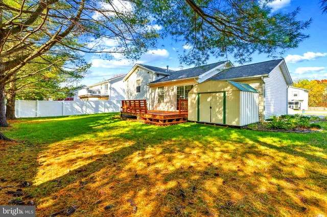 a view of yard with swimming pool