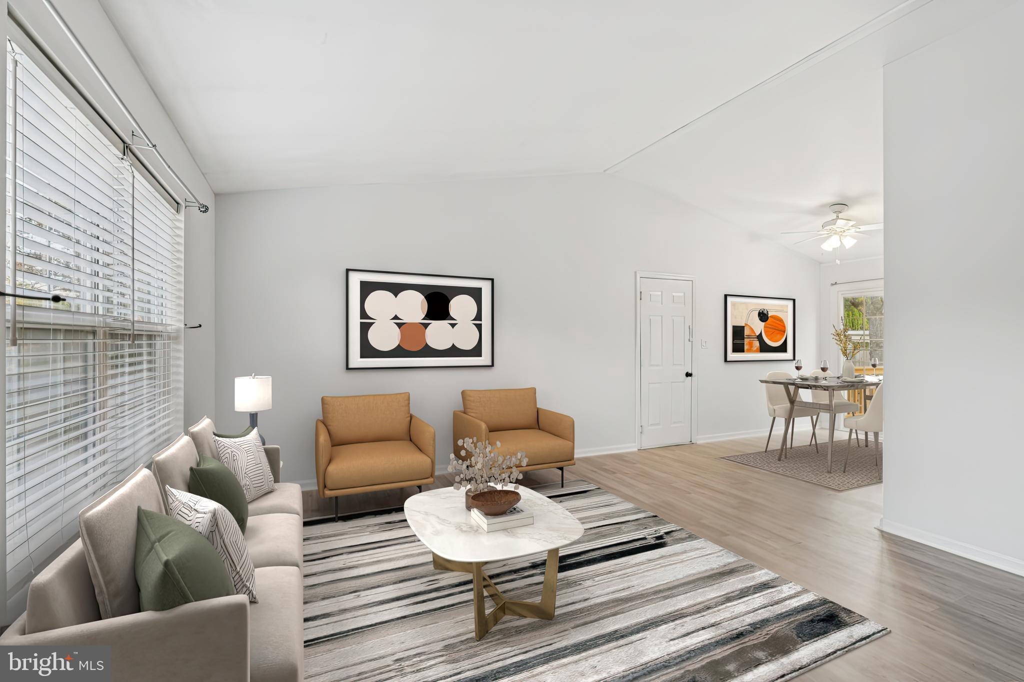 1151 Caton Road Hampstead, MD 21074 - Photo 9 of 43 a living room with furniture and a rug