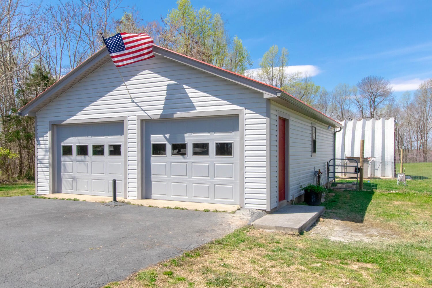 259 Toad Road Dowelltown, TN 37059 - Photo 14 of 19 a view of a house with a patio and a yard