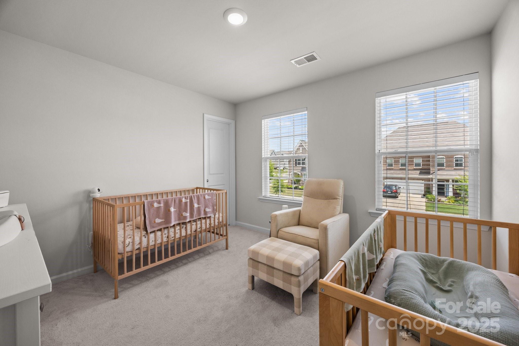 3643 Slider Terrace Lancaster, SC 29720 - Photo 11 of 46 a bedroom with furniture and a large window