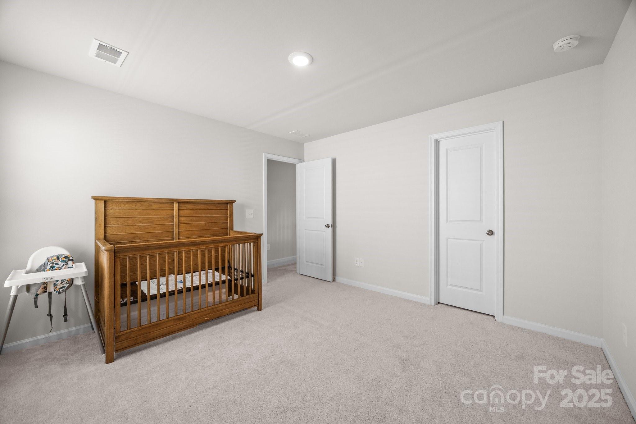 3643 Slider Terrace Lancaster, SC 29720 - Photo 17 of 46 a view of a room with furniture and baby crib