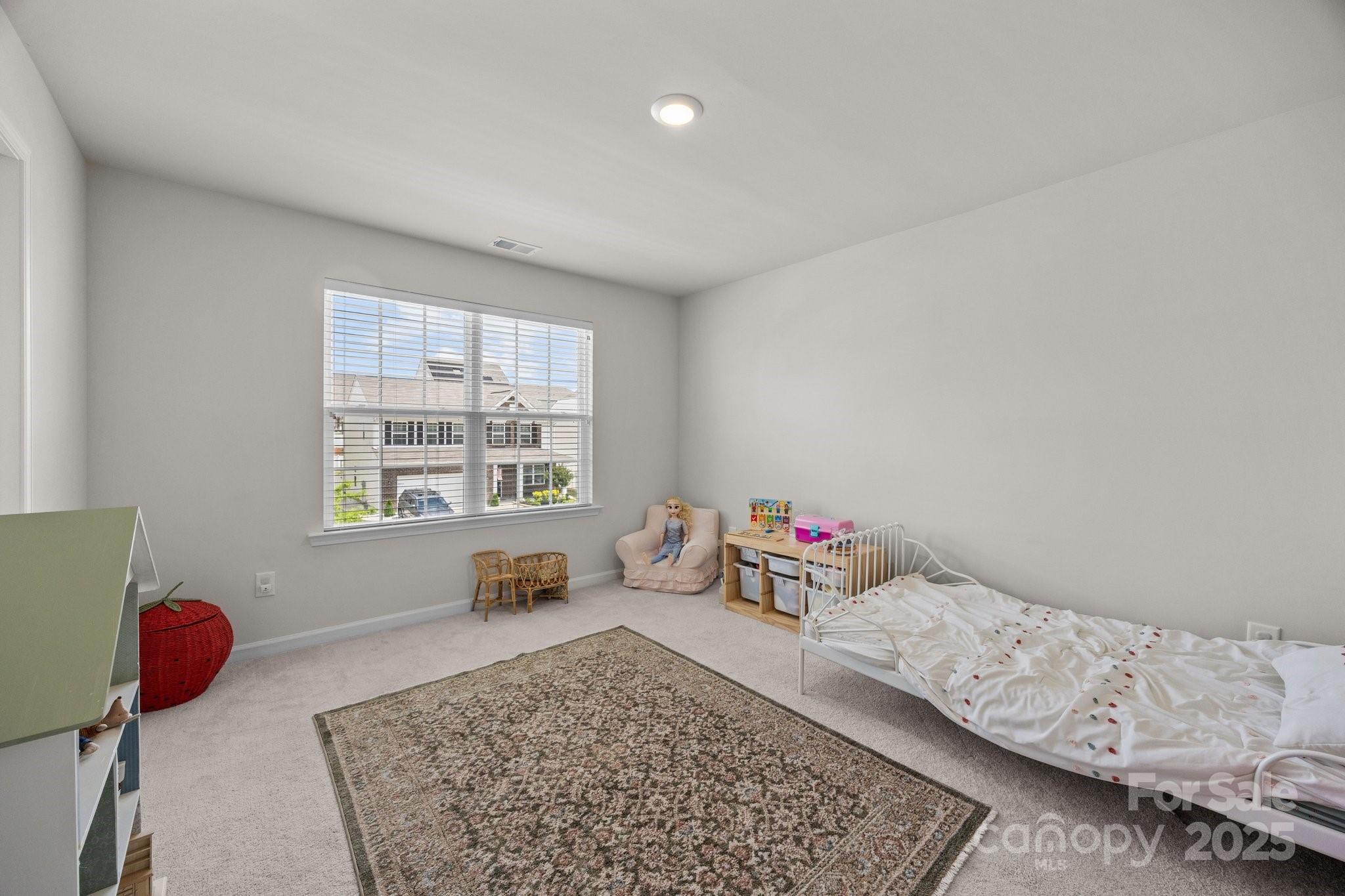 3643 Slider Terrace Lancaster, SC 29720 - Photo 24 of 46 a bedroom with furniture and a window