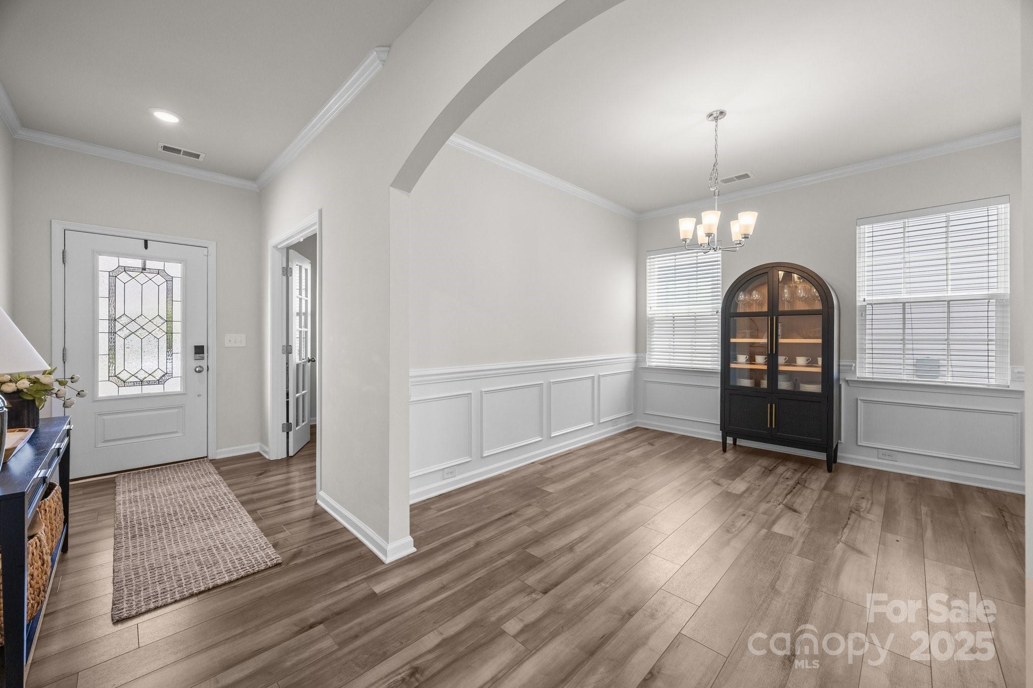 3643 Slider Terrace Lancaster, SC 29720 - Photo 27 of 46 wooden floor in an empty room with a window