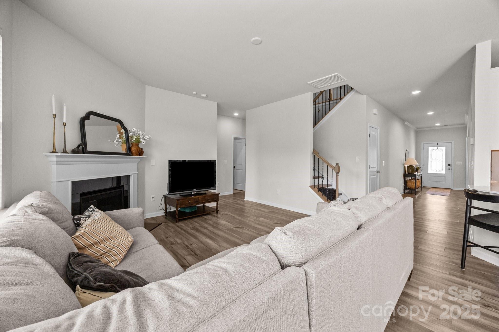 3643 Slider Terrace Lancaster, SC 29720 - Photo 3 of 46 a living room with furniture and a fireplace