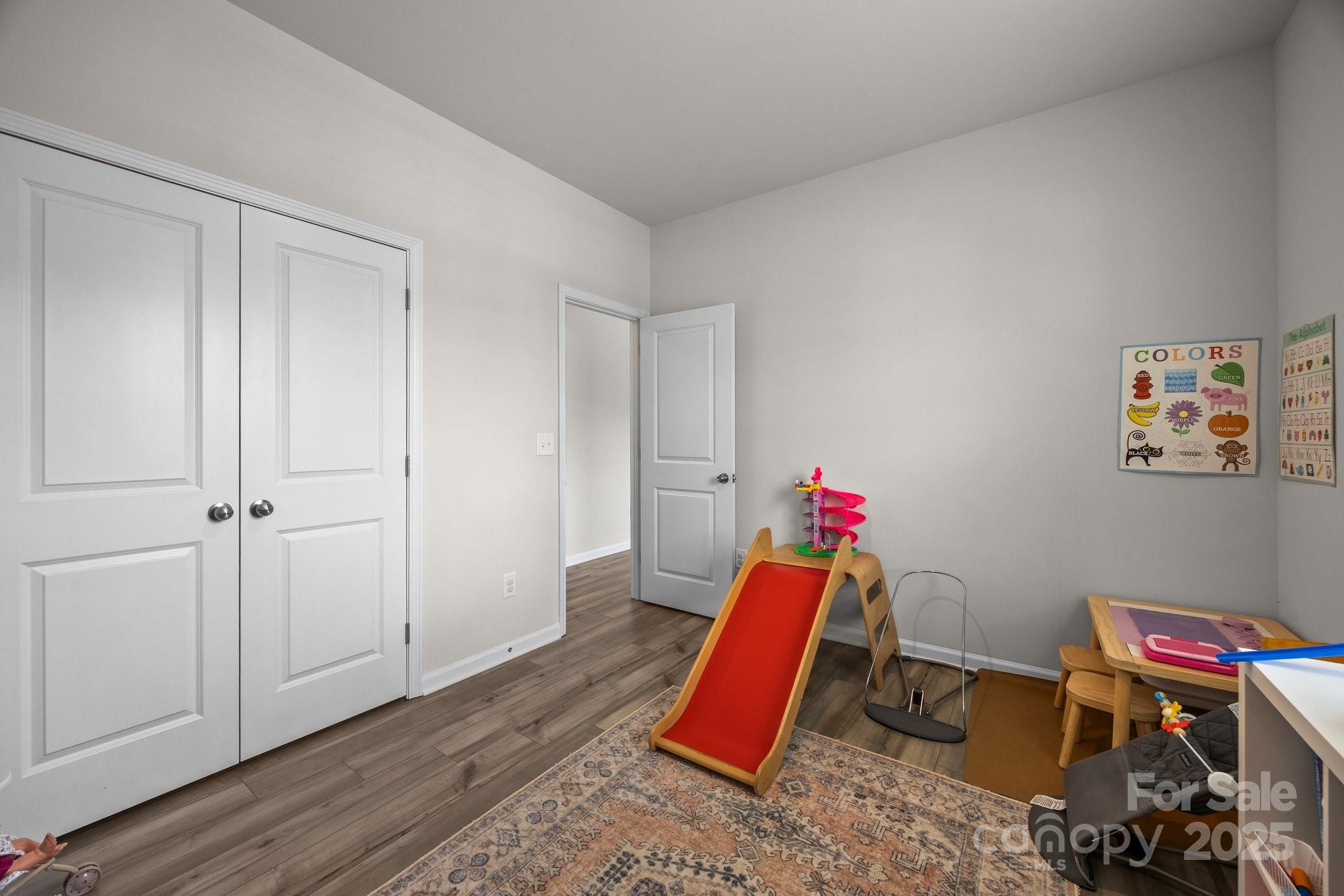 3643 Slider Terrace Lancaster, SC 29720 - Photo 31 of 46 a view of a room with gym equipment and wooden floor