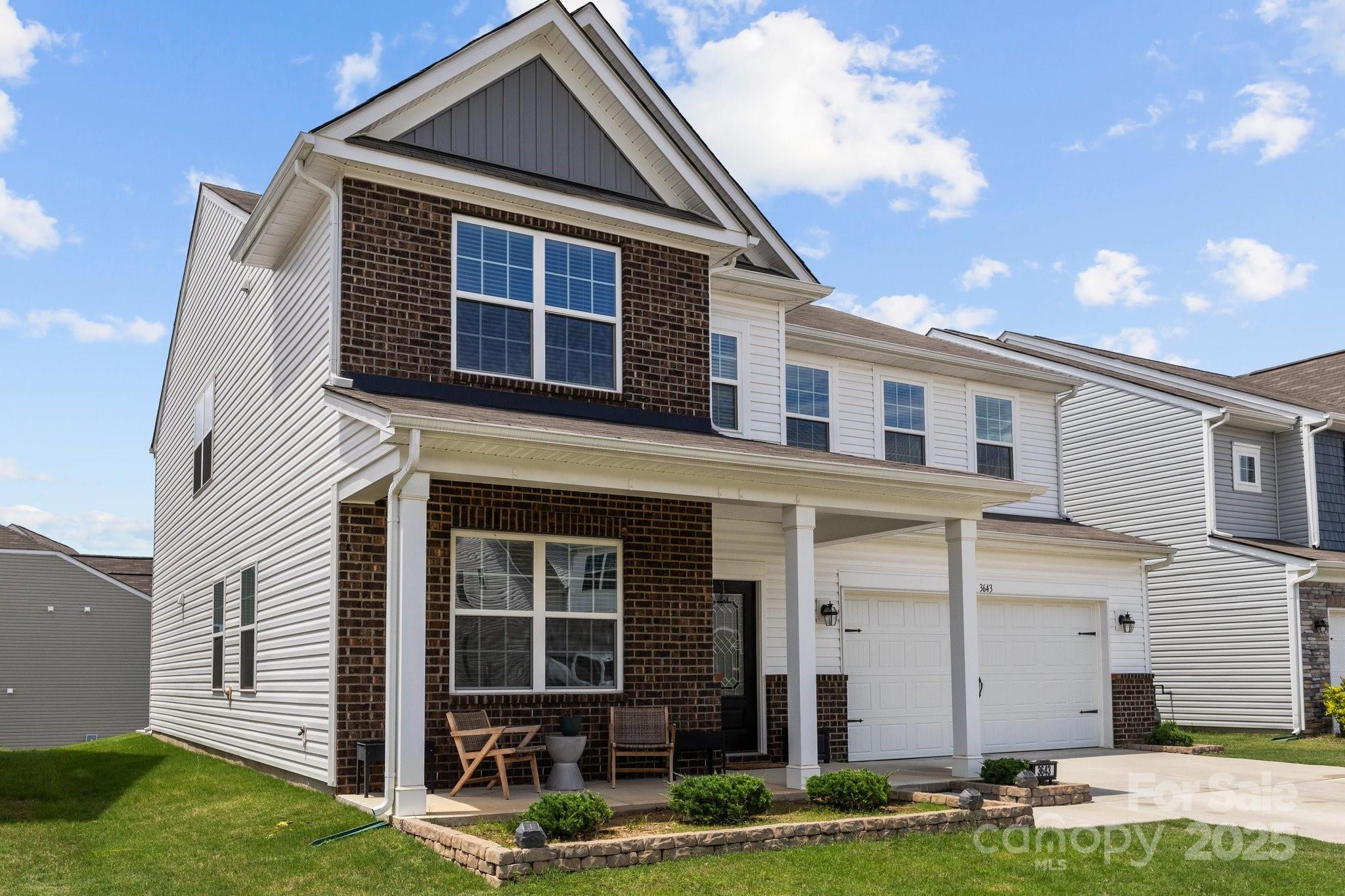3643 Slider Terrace Lancaster, SC 29720 - Photo 32 of 46 a front view of a house with garden