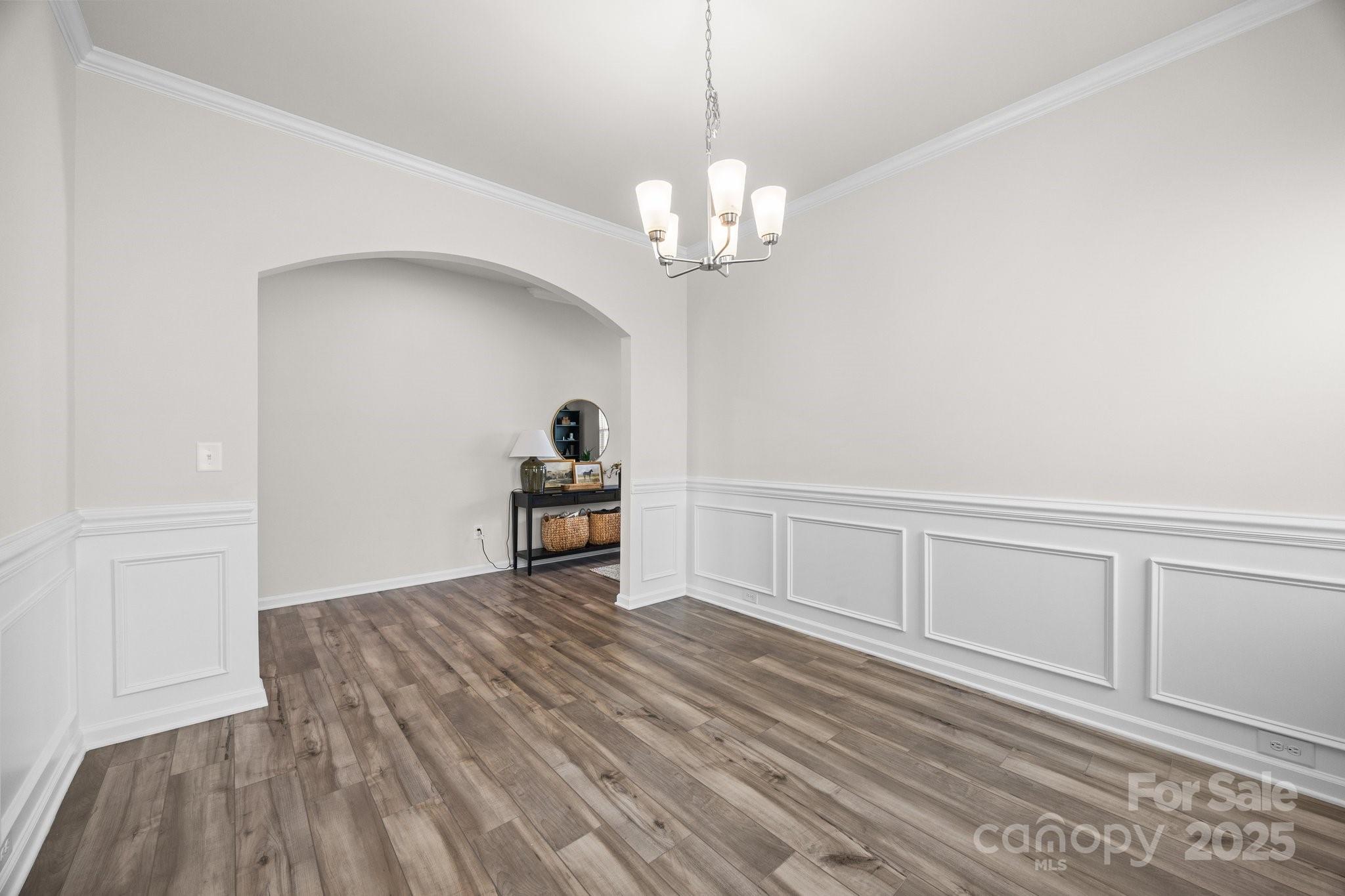 3643 Slider Terrace Lancaster, SC 29720 - Photo 36 of 46 a view of empty room with wooden floor