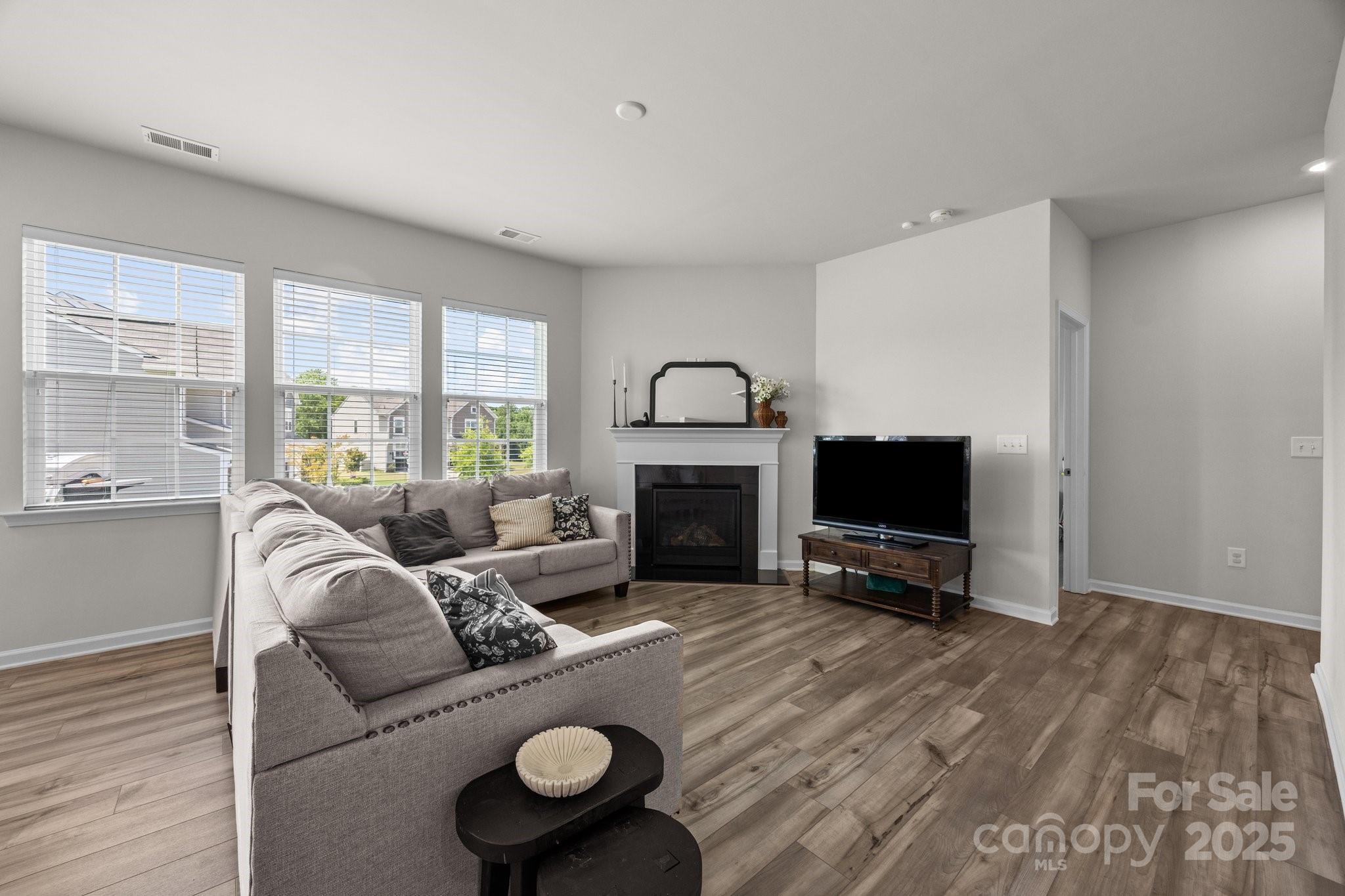 3643 Slider Terrace Lancaster, SC 29720 - Photo 42 of 46 a living room with furniture a window and a flat screen tv