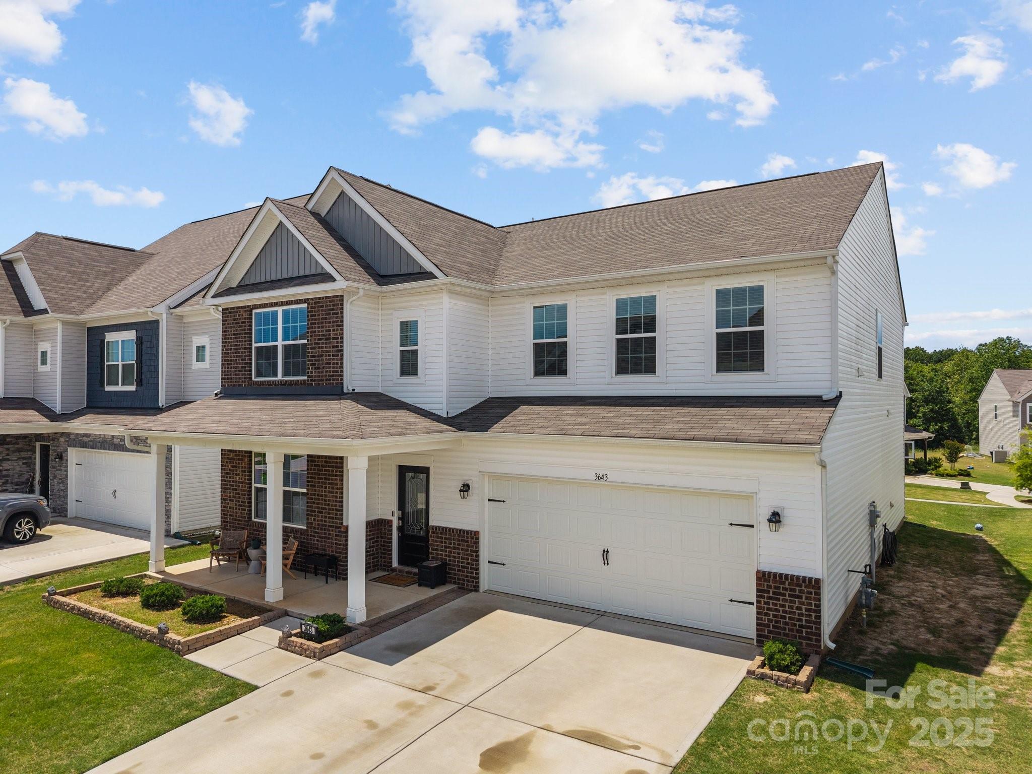 3643 Slider Terrace Lancaster, SC 29720 - Photo 45 of 46 a front view of house with yard outdoor seating and barbeque oven