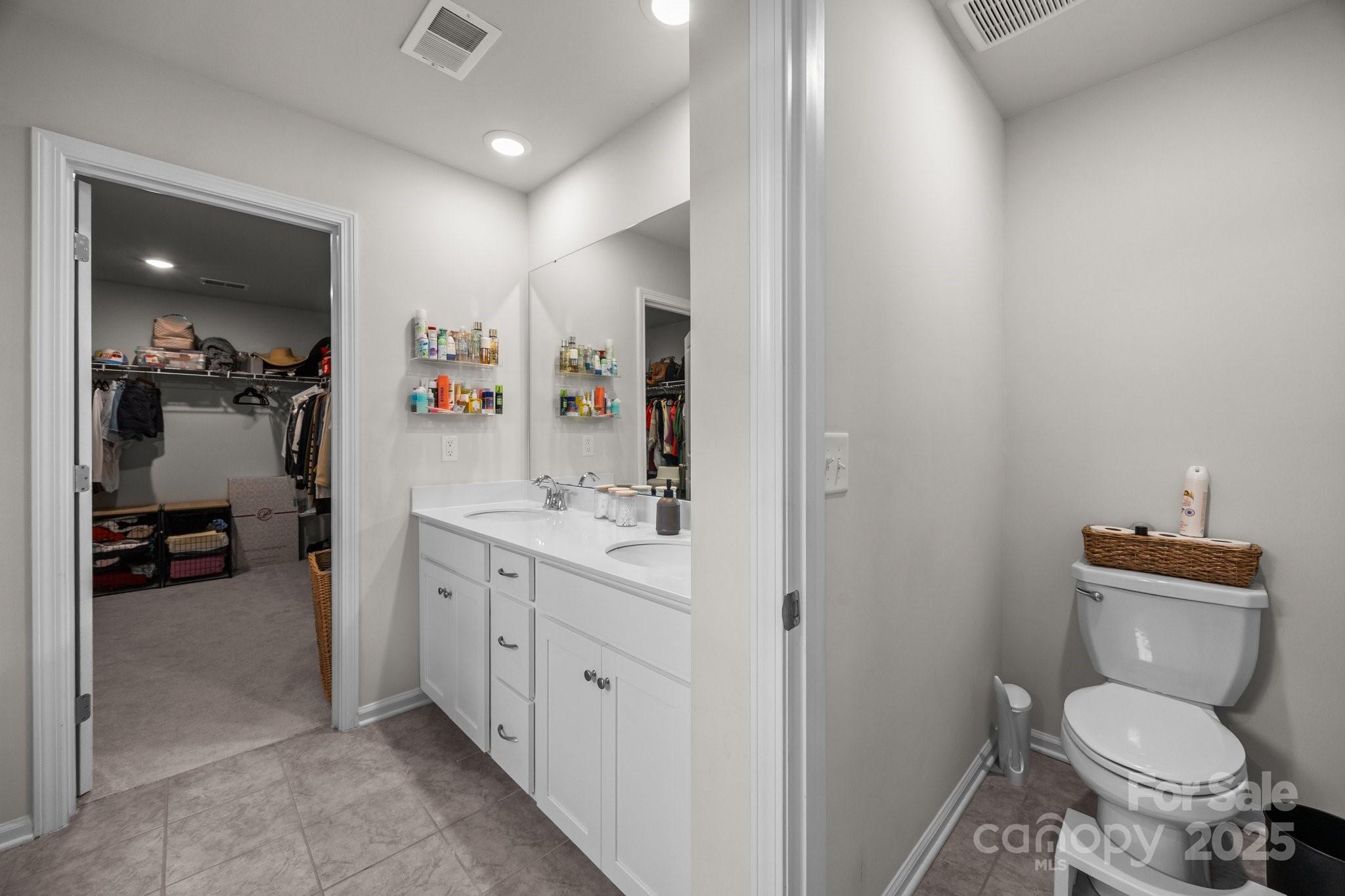 3643 Slider Terrace Lancaster, SC 29720 - Photo 7 of 46 a bathroom with a toilet sink and mirror
