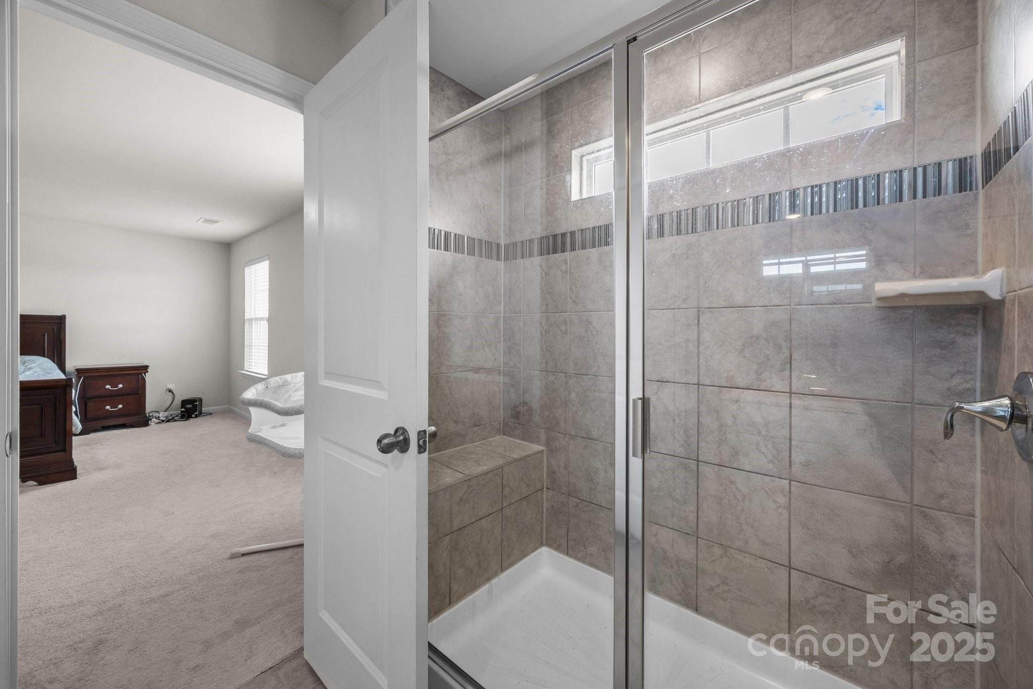 3643 Slider Terrace Lancaster, SC 29720 - Photo 8 of 46 a bathroom with a shower