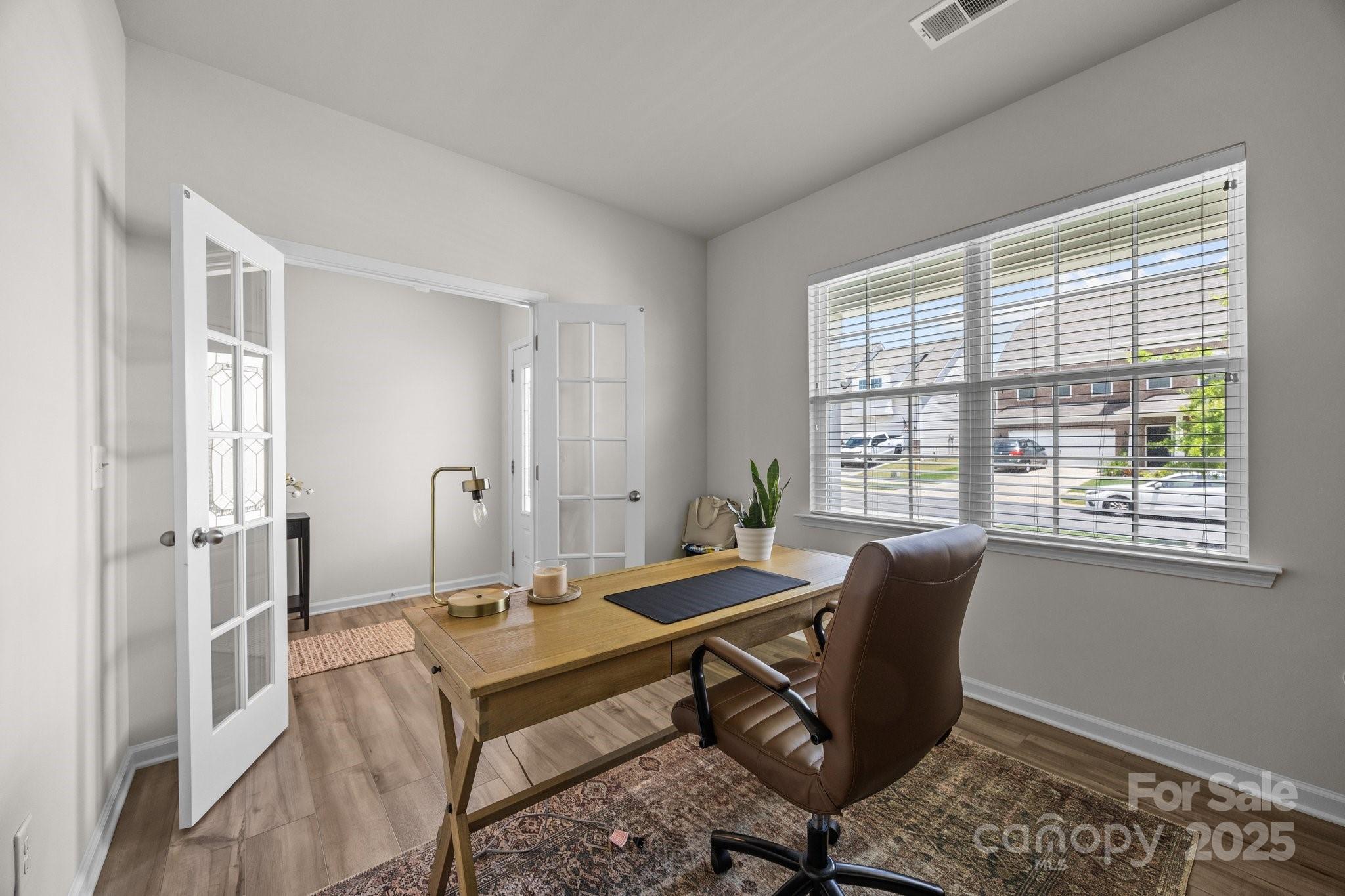 3643 Slider Terrace Lancaster, SC 29720 - Photo 9 of 46 a view of a workspace with furniture and a window