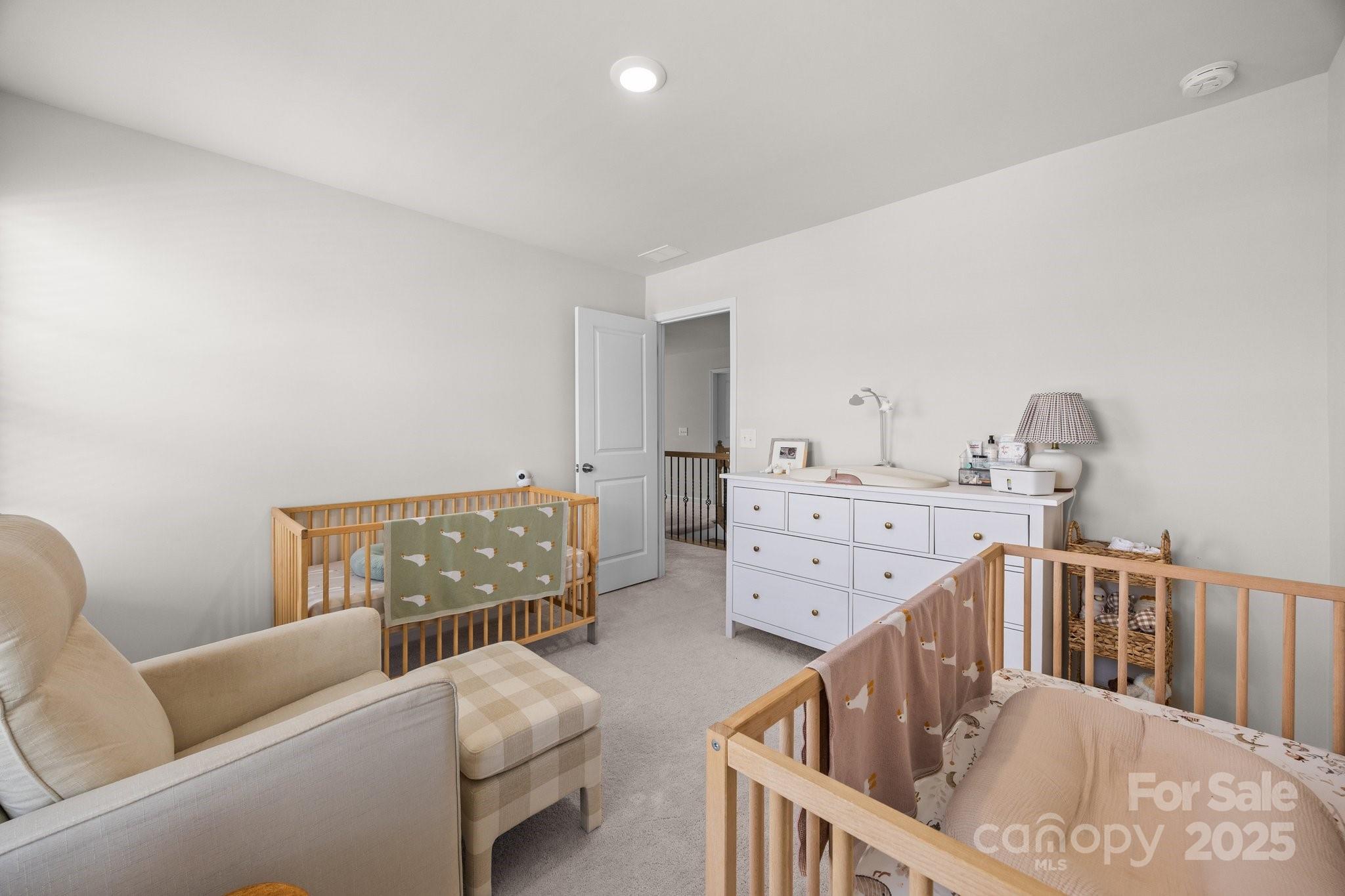 3643 Slider Terrace Lancaster, SC 29720 - Photo 10 of 46 a living room with furniture and baby crib
