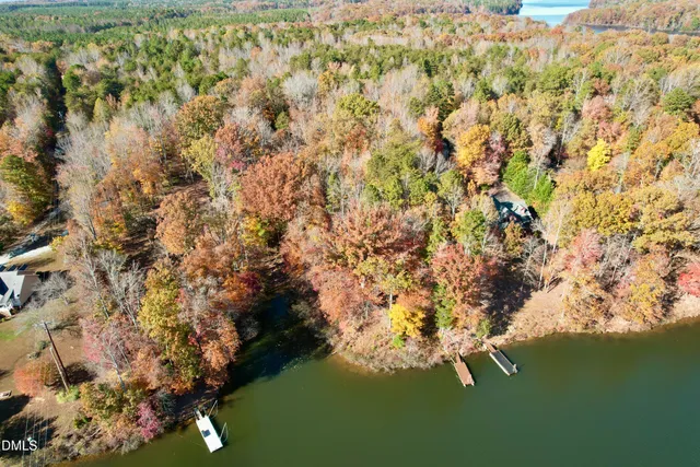 a view of lake from under an umbrella