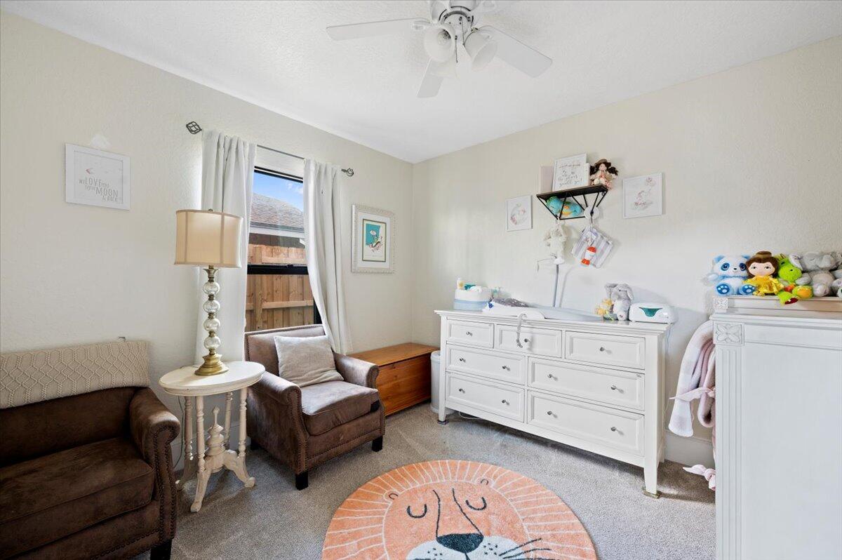 6430 Barbara Street Jupiter, FL 33458 - Photo 13 of 18 a bedroom with furniture and a window