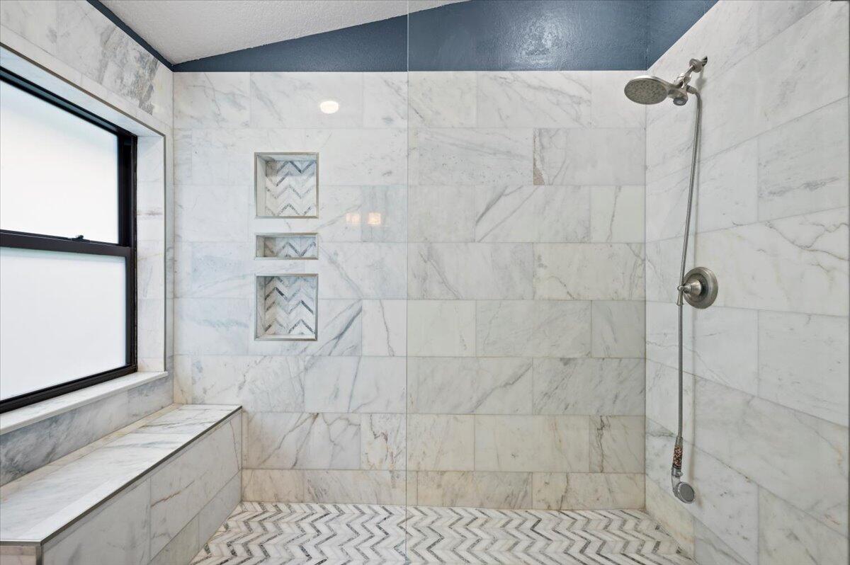 6430 Barbara Street Jupiter, FL 33458 - Photo 10 of 18 a bathroom with a shower