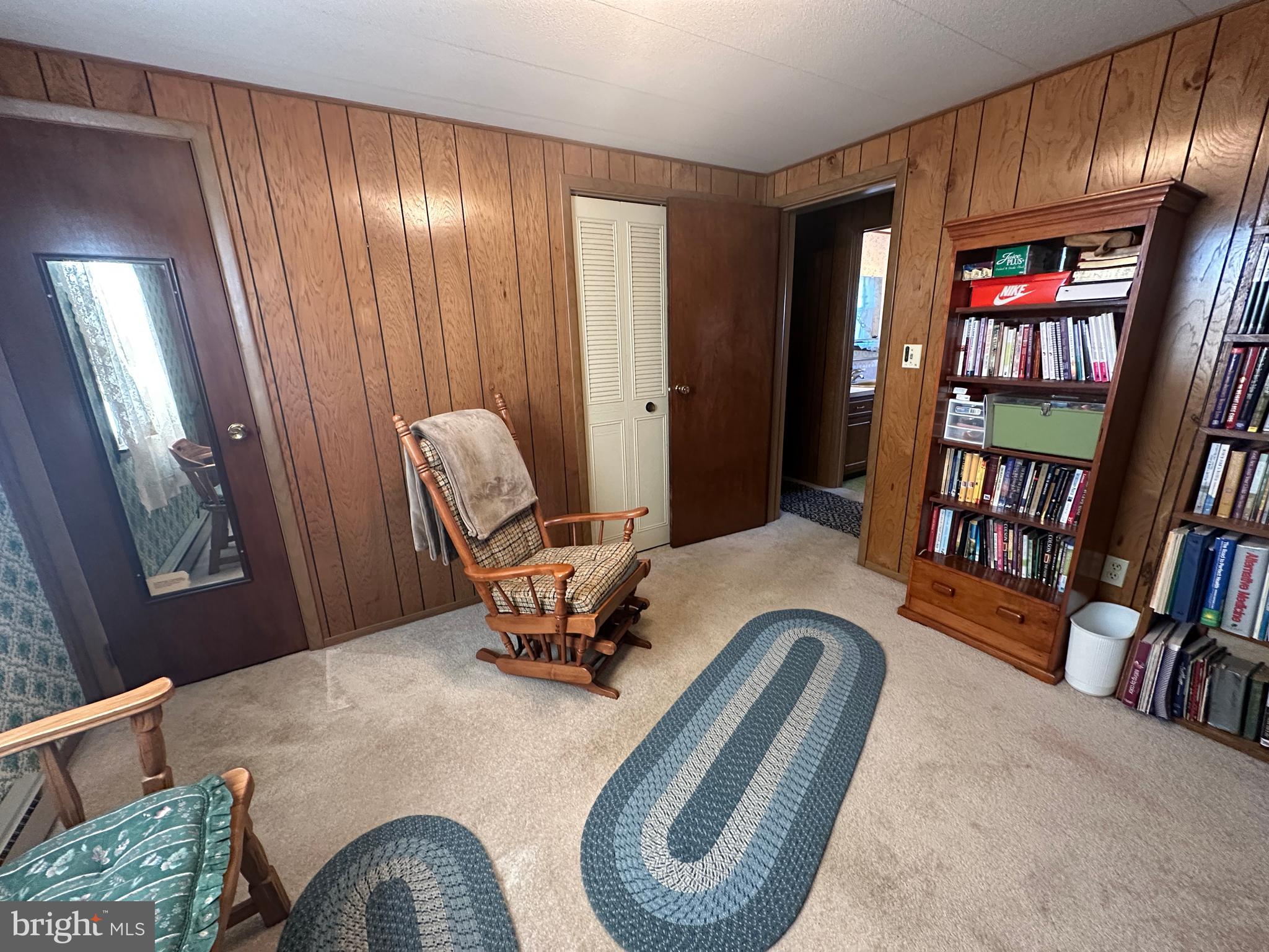 375 St Thomas-Edenville Road St. Thomas, PA 17252 - Photo 43 of 85 a living room with furniture and a book shelf
