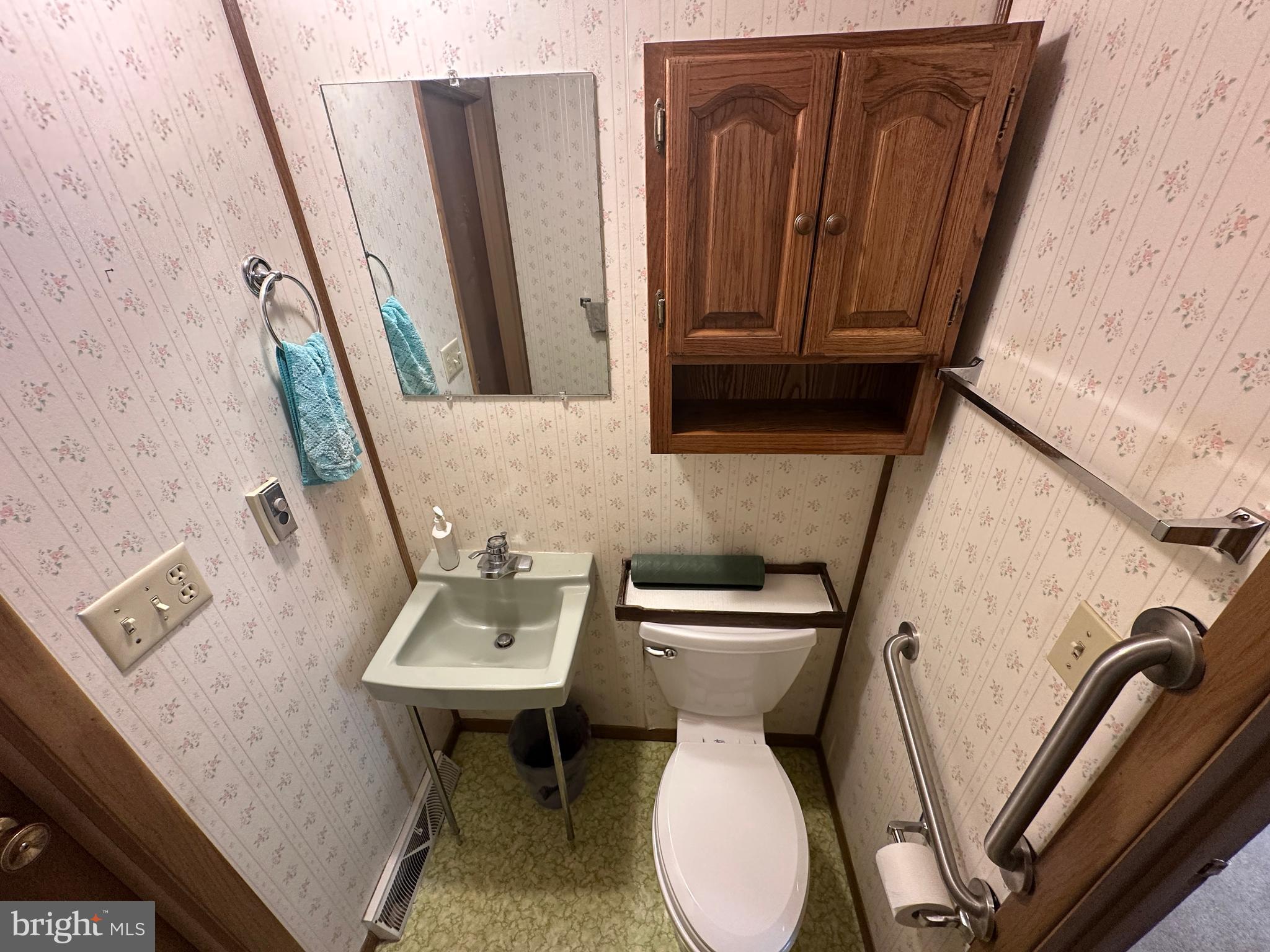 375 St Thomas-Edenville Road St. Thomas, PA 17252 - Photo 46 of 85 a bathroom with a toilet sink and mirror