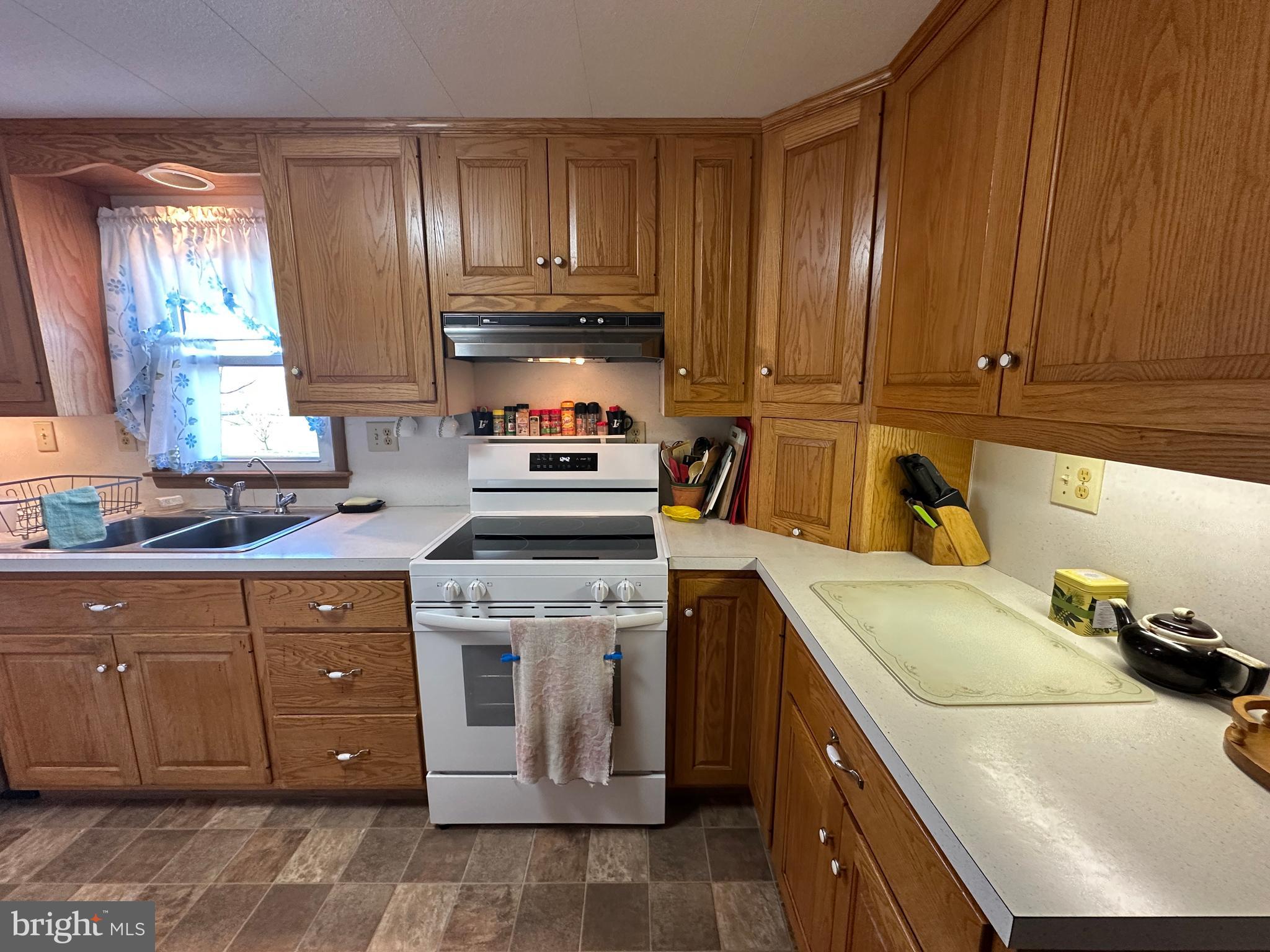 375 St Thomas-Edenville Road St. Thomas, PA 17252 - Photo 57 of 85 a kitchen with a sink stove and cabinets