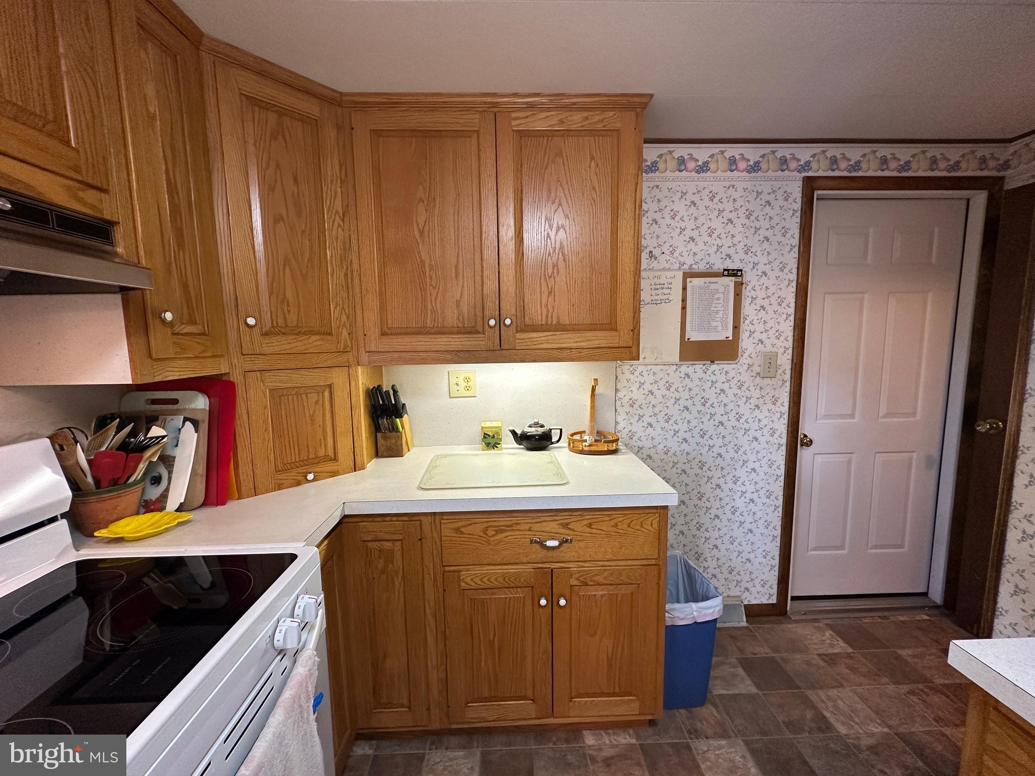 375 St Thomas-Edenville Road St. Thomas, PA 17252 - Photo 58 of 85 a kitchen with stainless steel appliances granite countertop a sink stove and cabinets