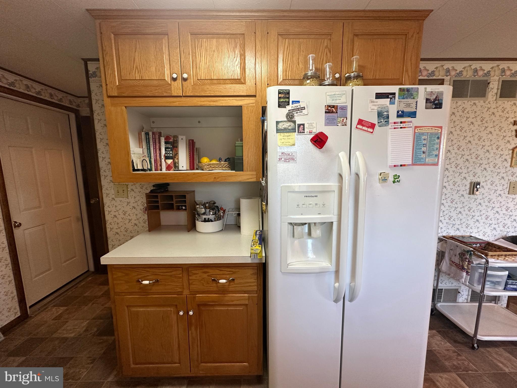 375 St Thomas-Edenville Road St. Thomas, PA 17252 - Photo 59 of 85 a view of a kitchen with fridge and wooden floor