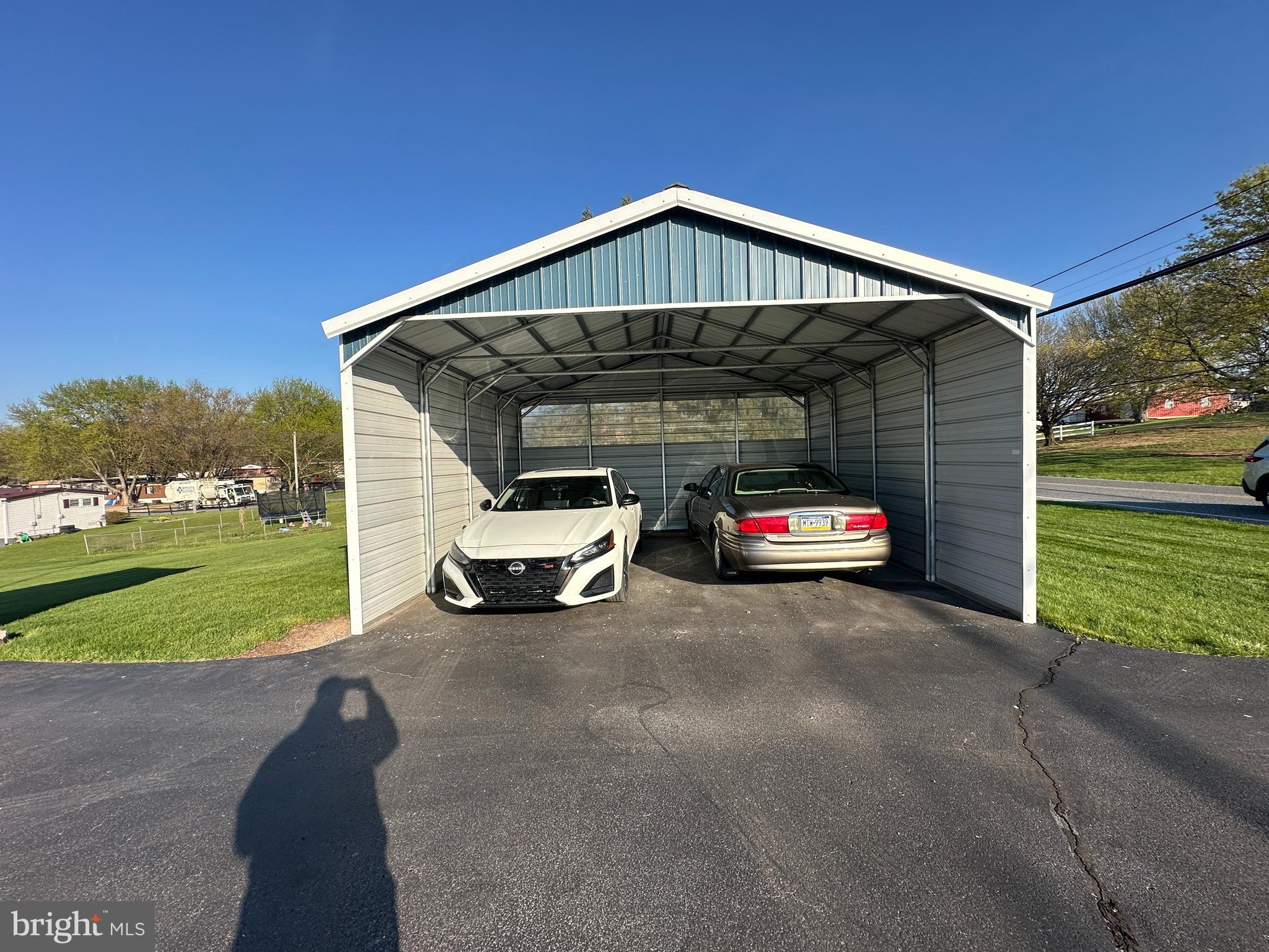 375 St Thomas-Edenville Road St. Thomas, PA 17252 - Photo 10 of 85 a car parked in front of a house with a parked car