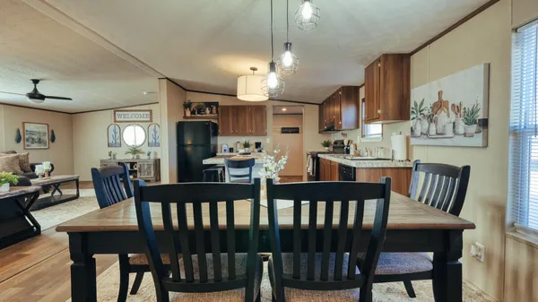 a view of a dining room with furniture