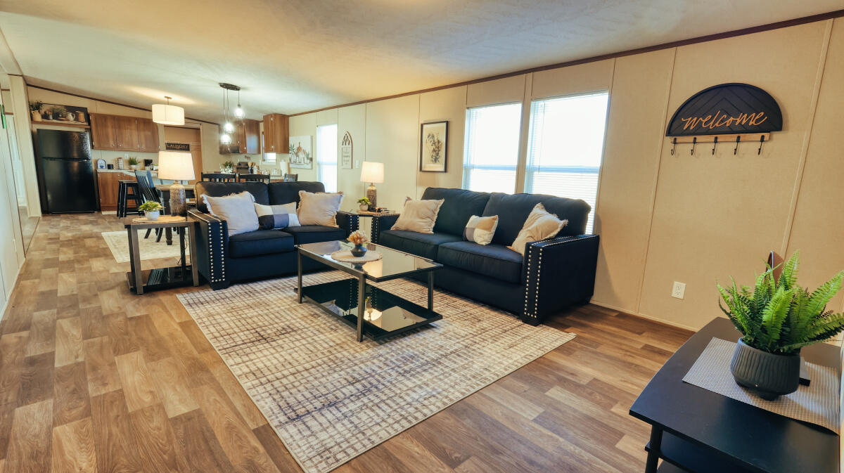 508 Sage Road Tahoka, TX 79373 - Photo 21 of 32 a living room with furniture and a potted plant