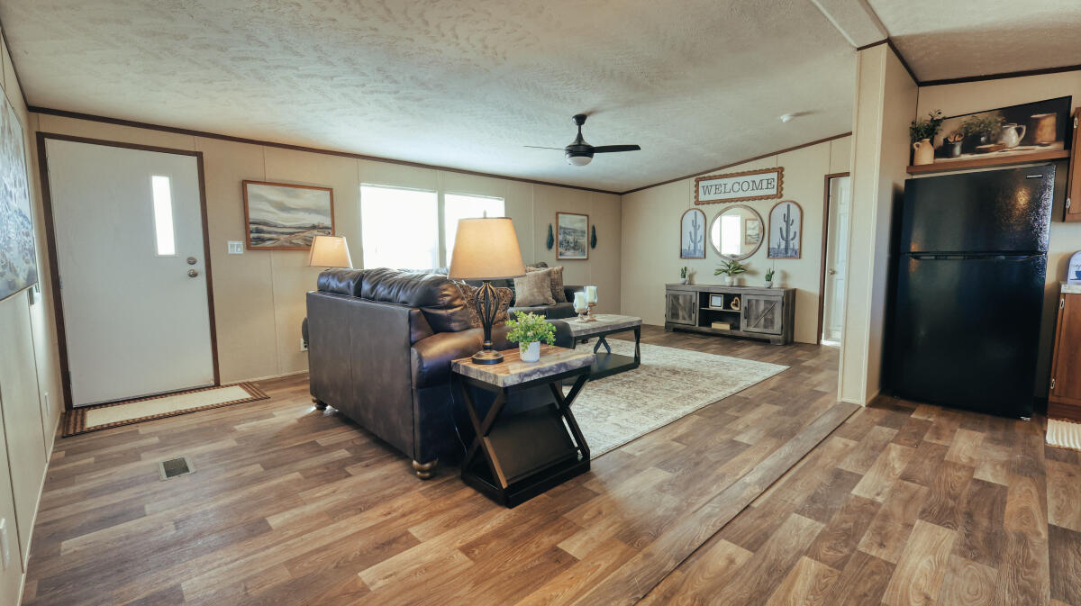 508 Sage Road Tahoka, TX 79373 - Photo 4 of 32 a living room with furniture and a large window