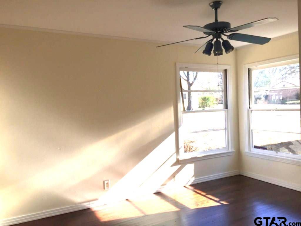 509 North Line Street Mineola, TX 75773 - Photo 11 of 16 a view of an empty room with a window