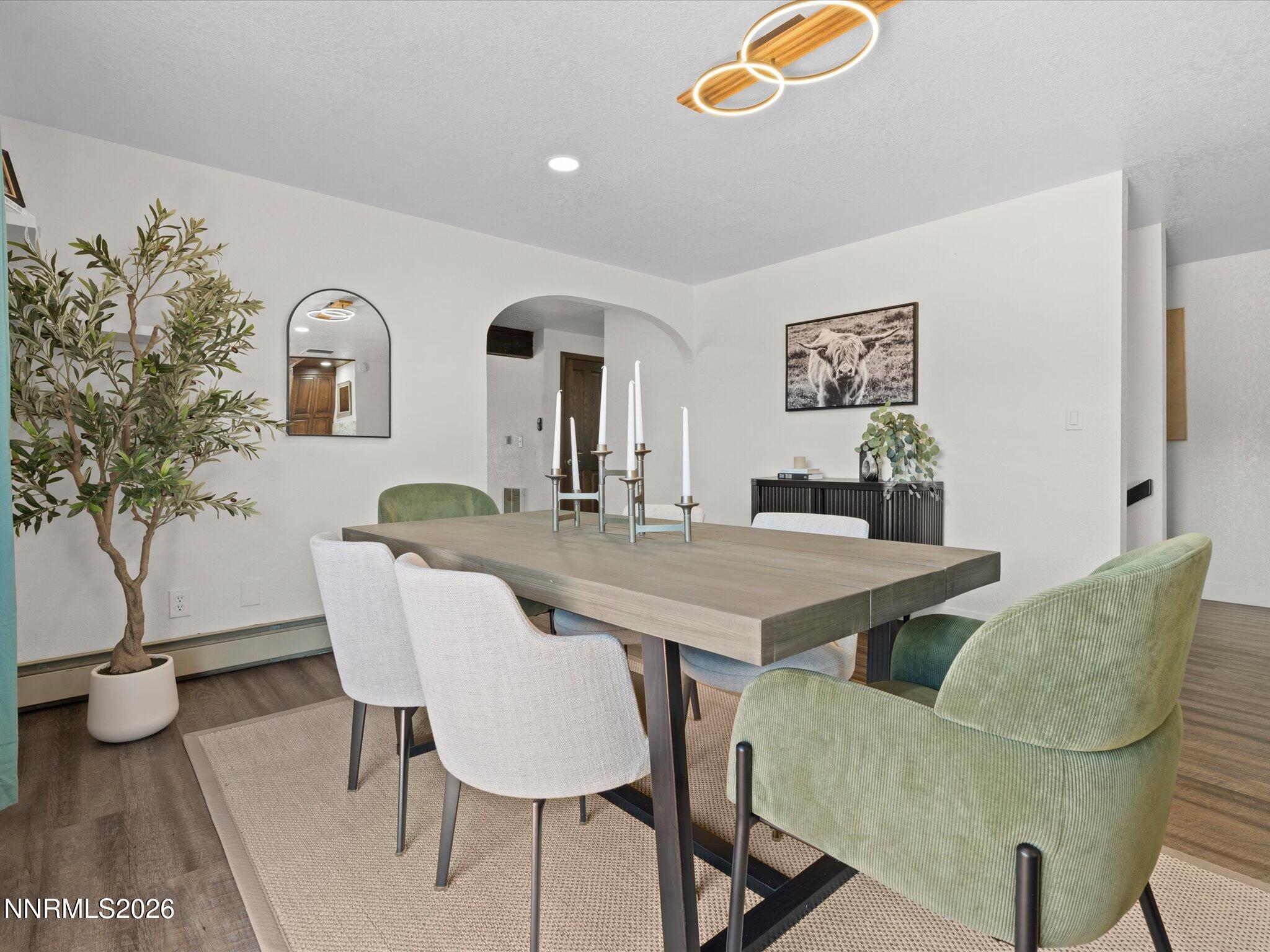 20449 Temelec Way Reno, NV 89521 - Photo 20 of 65 a view of a dining room with furniture and wooden floor