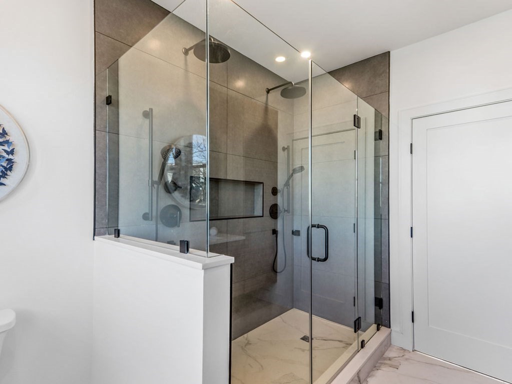 1917 Commonwealth Avenue, Unit 1917 Newton, MA 02466 - Photo 18 of 30 a bathroom with a shower and a sink