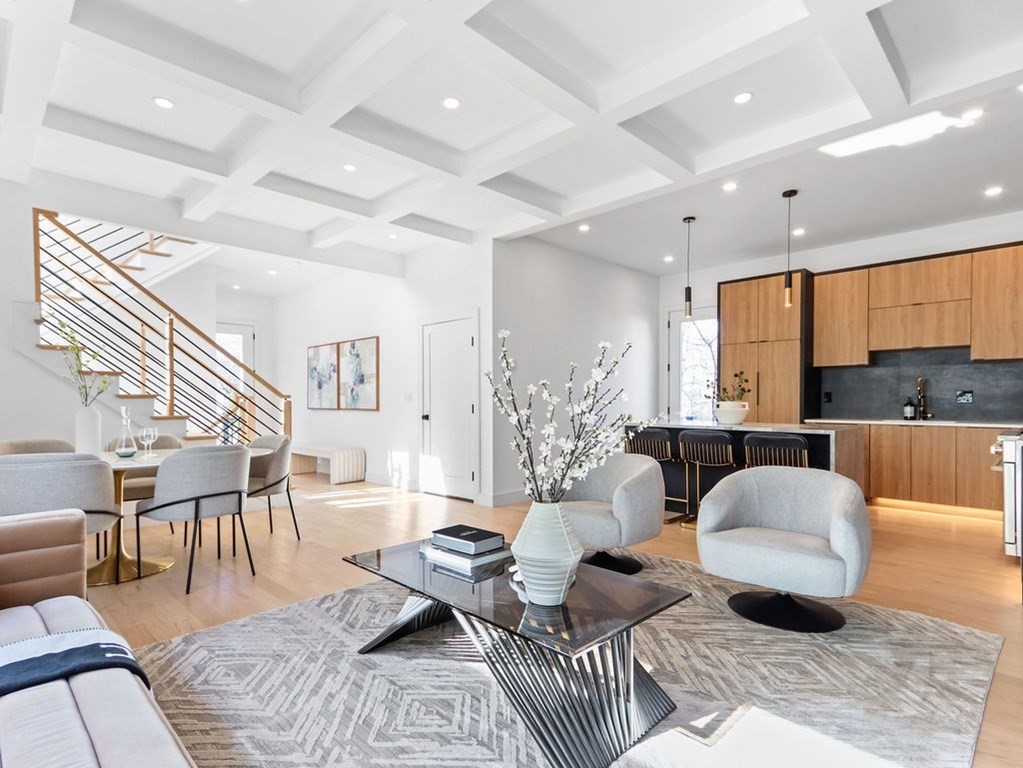 1917 Commonwealth Avenue, Unit 1917 Newton, MA 02466 - Photo 3 of 30 a living room with furniture and a large window
