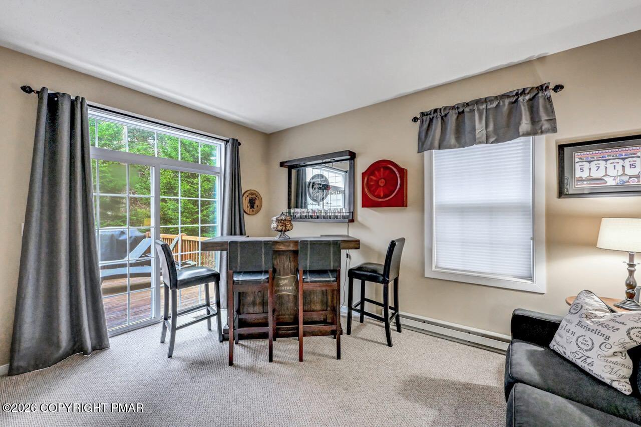 151 Skytop Road Long Pond, PA 18334 - Photo 12 of 36 a view of a livingroom with furniture and window