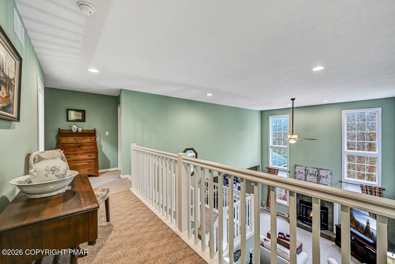 151 Skytop Road Long Pond, PA 18334 - Photo 16 of 36 a view of a hallway with furniture and window