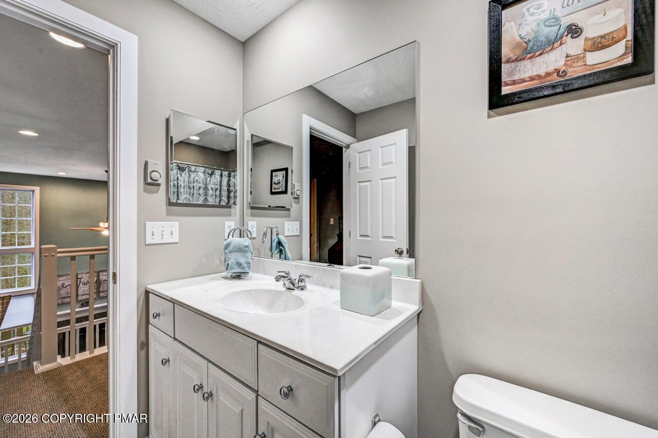 151 Skytop Road Long Pond, PA 18334 - Photo 26 of 36 a bathroom with a sink toilet and shower
