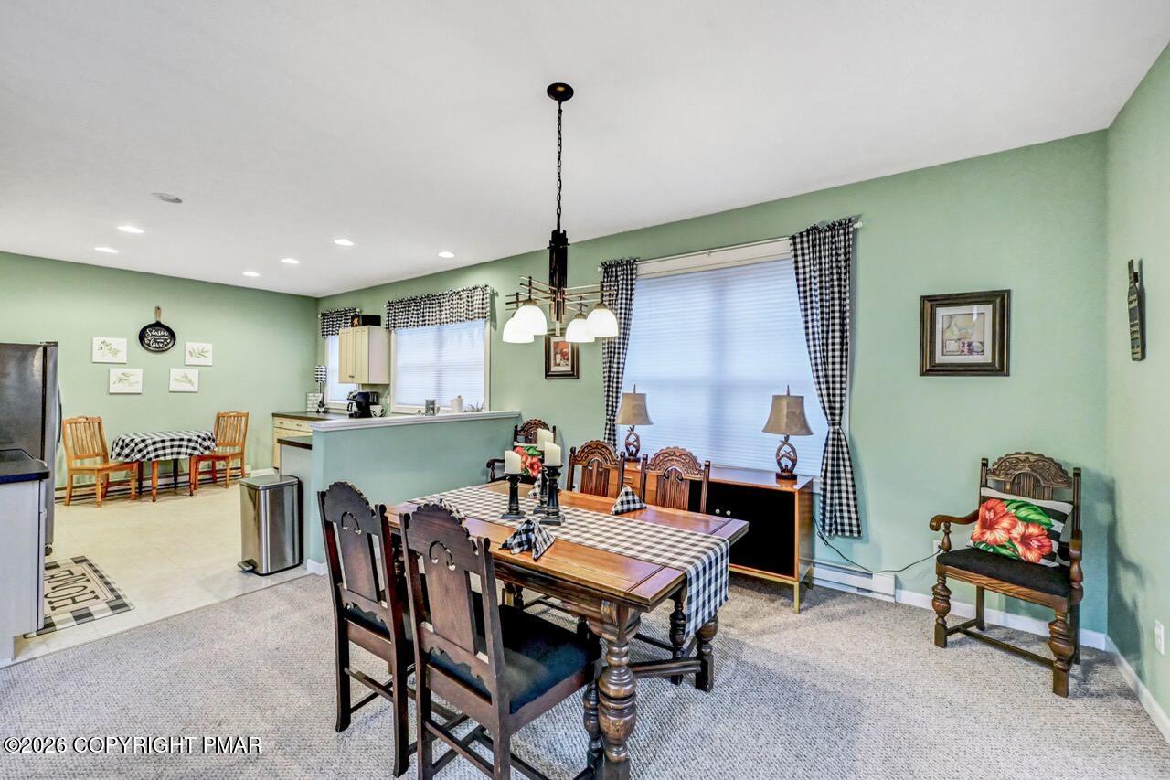 151 Skytop Road Long Pond, PA 18334 - Photo 8 of 36 a dining room with furniture and window