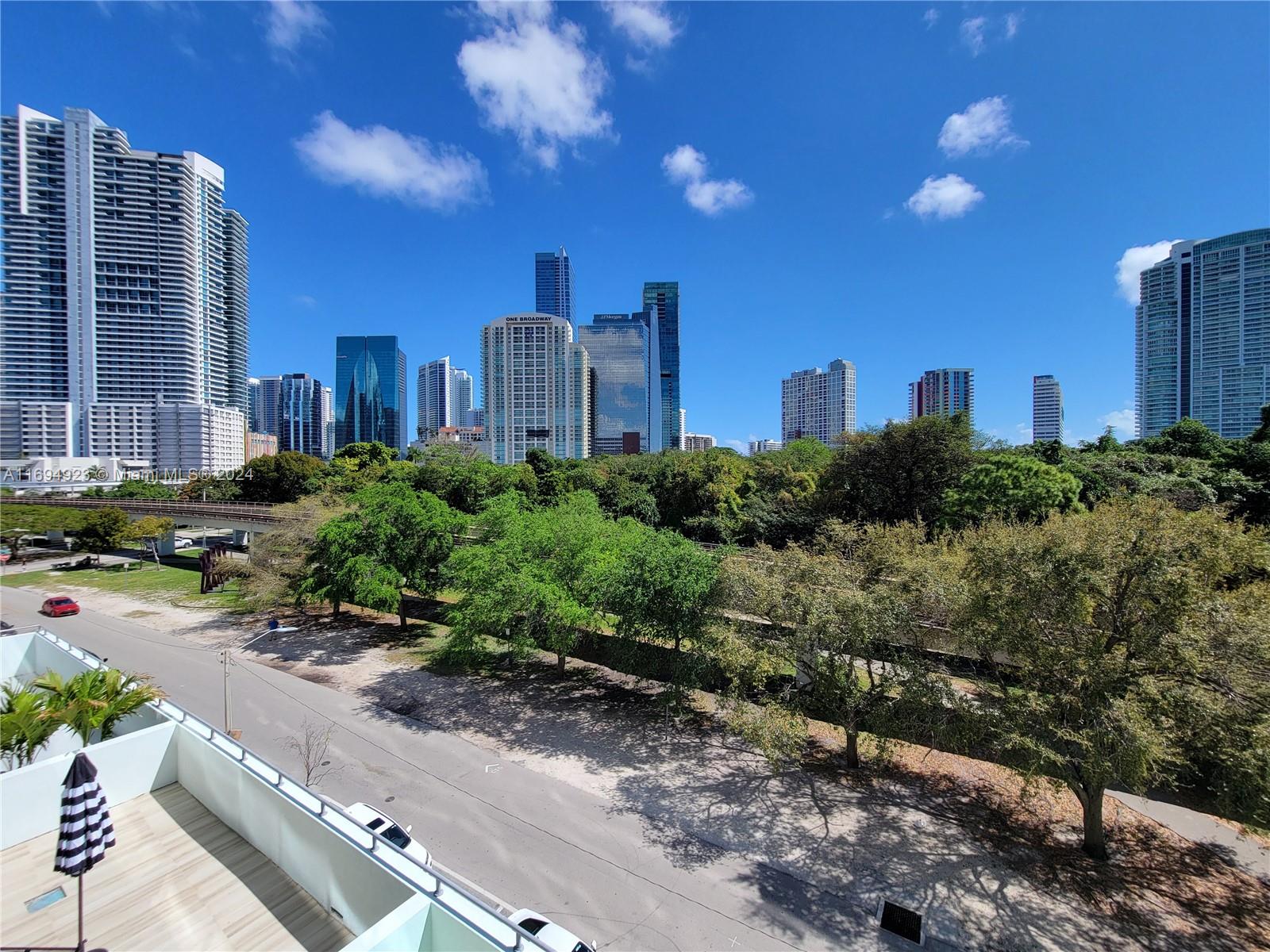 1600 Southwest 1st Avenue, Unit 411 Miami, FL 33129 - Photo 12 of 15 a view of a city with tall buildings
