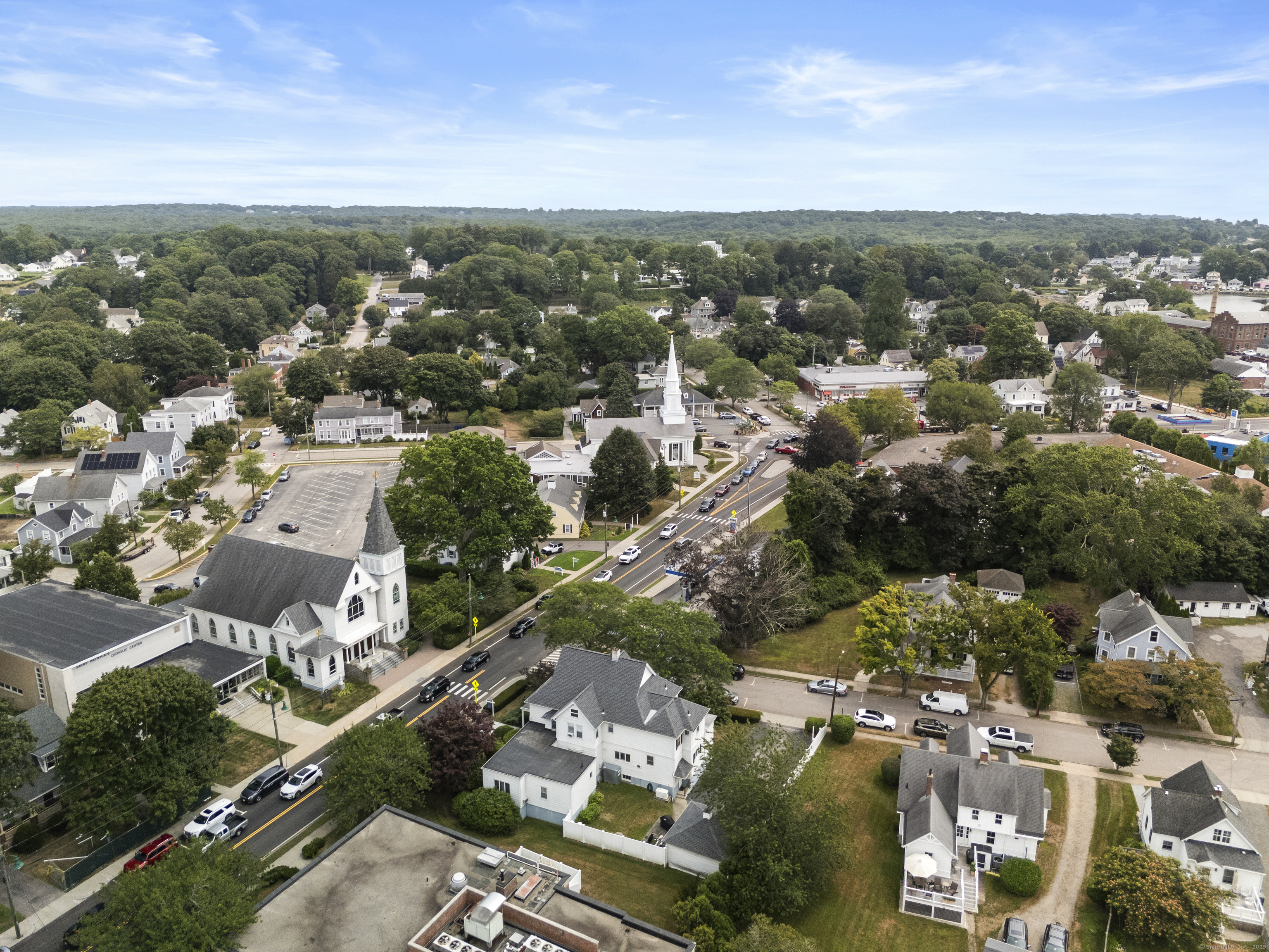 32 East Main Street Mystic, CT 06355 - Photo 18 of 40 an aerial view of residential houses with city view