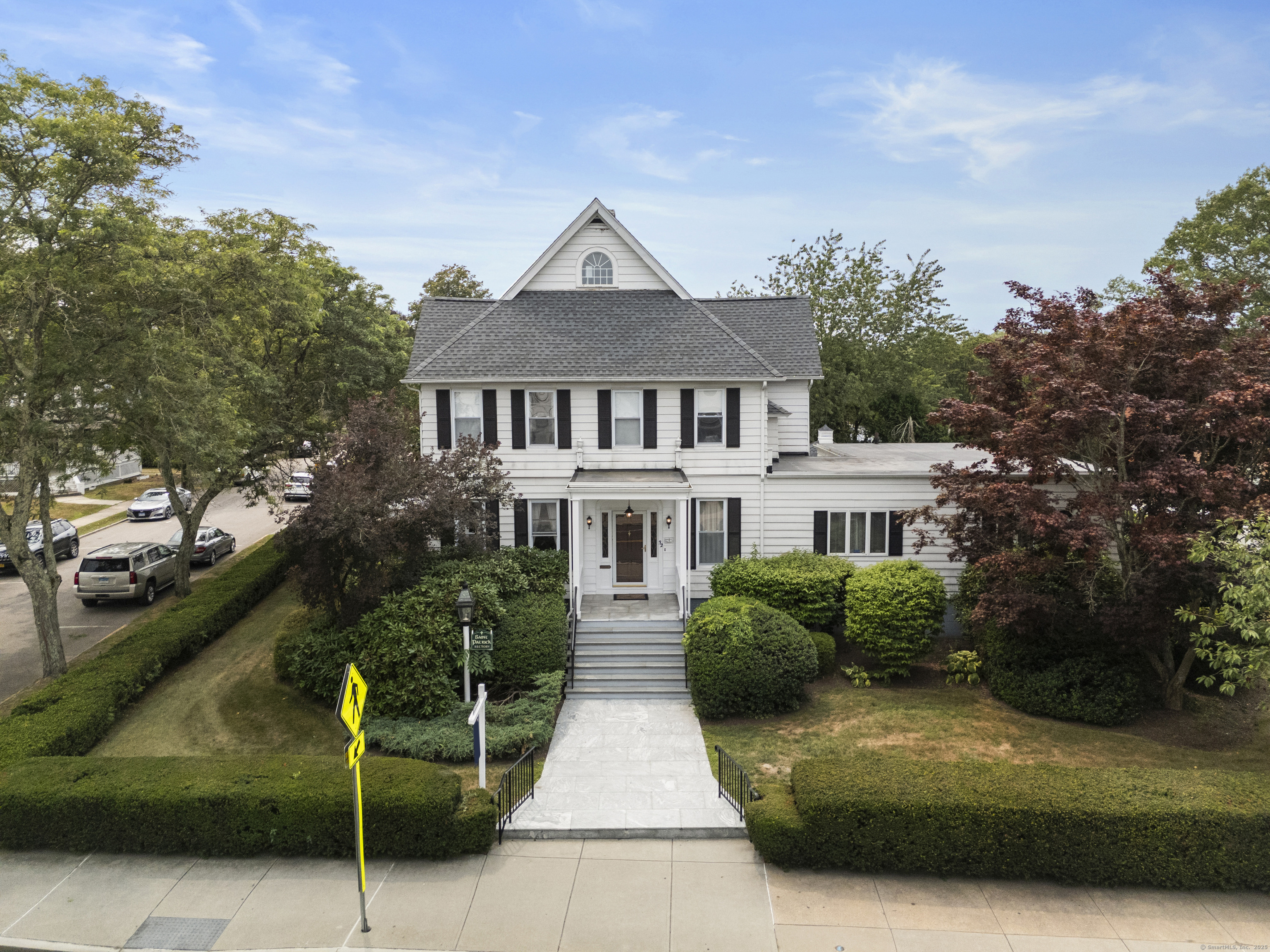 32 East Main Street Mystic, CT 06355 - Photo 21 of 40 a view of house with yard and green space