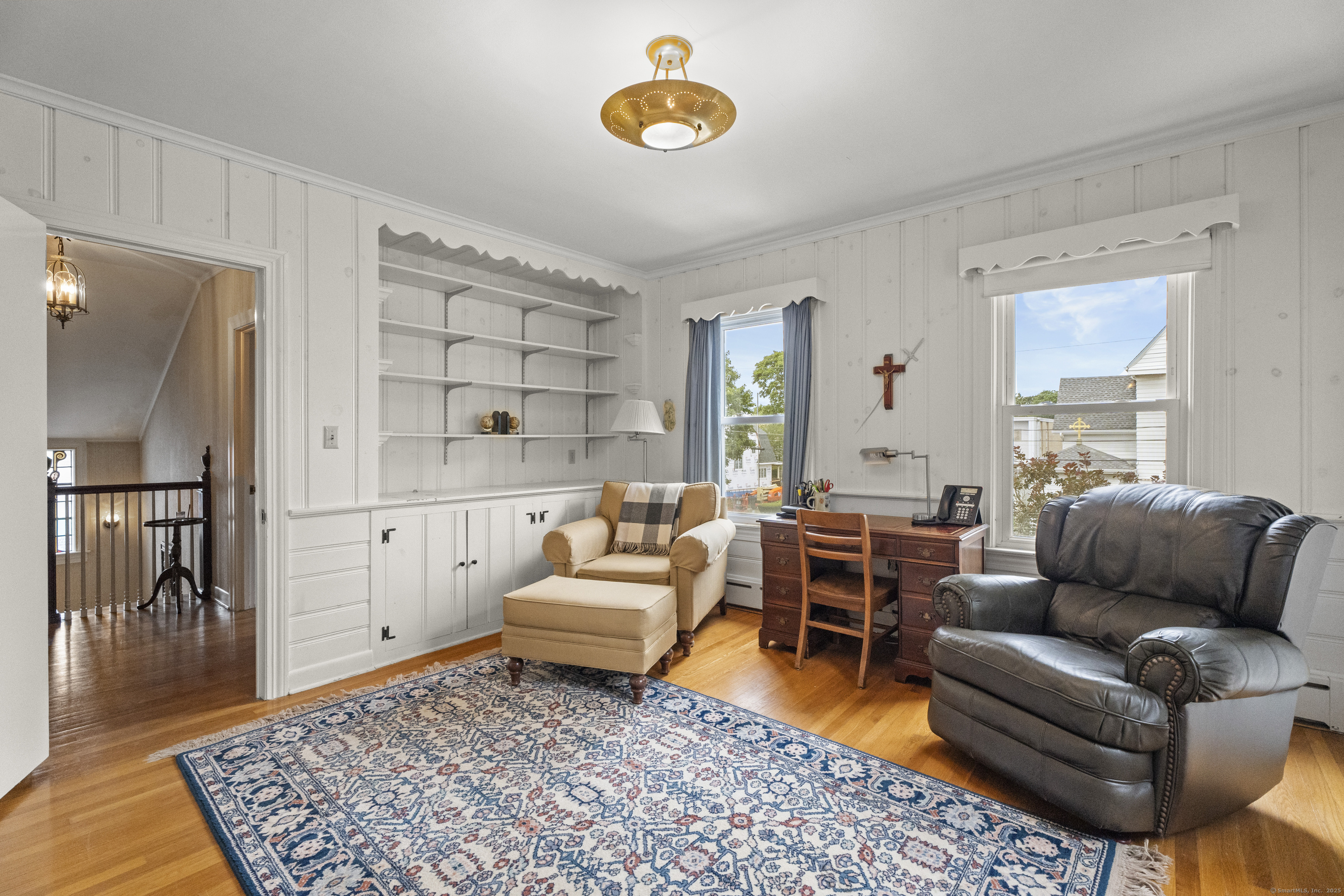 32 East Main Street Mystic, CT 06355 - Photo 22 of 40 a living room with furniture and a rug
