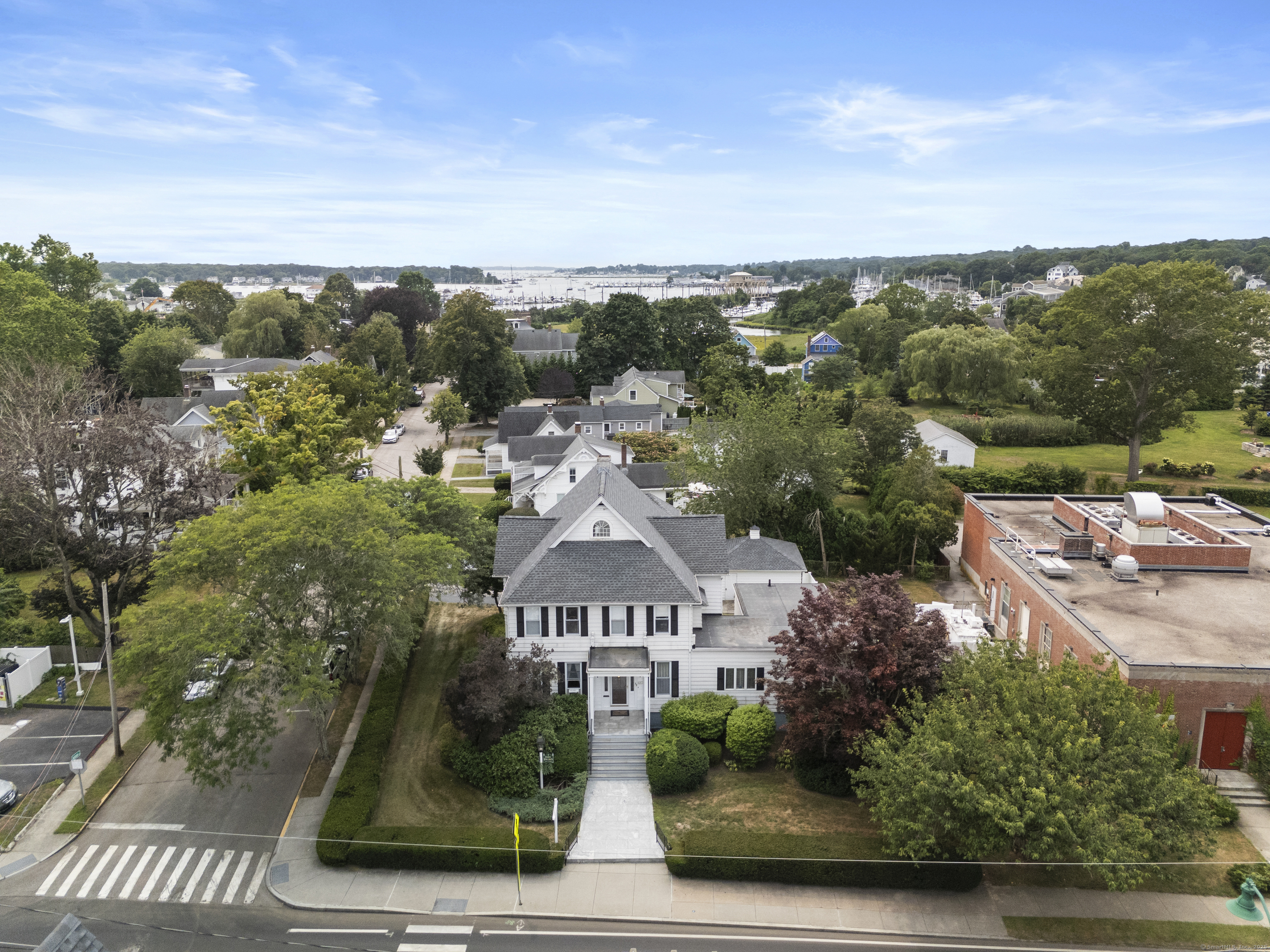 32 East Main Street Mystic, CT 06355 - Photo 4 of 40 an aerial view of multiple house