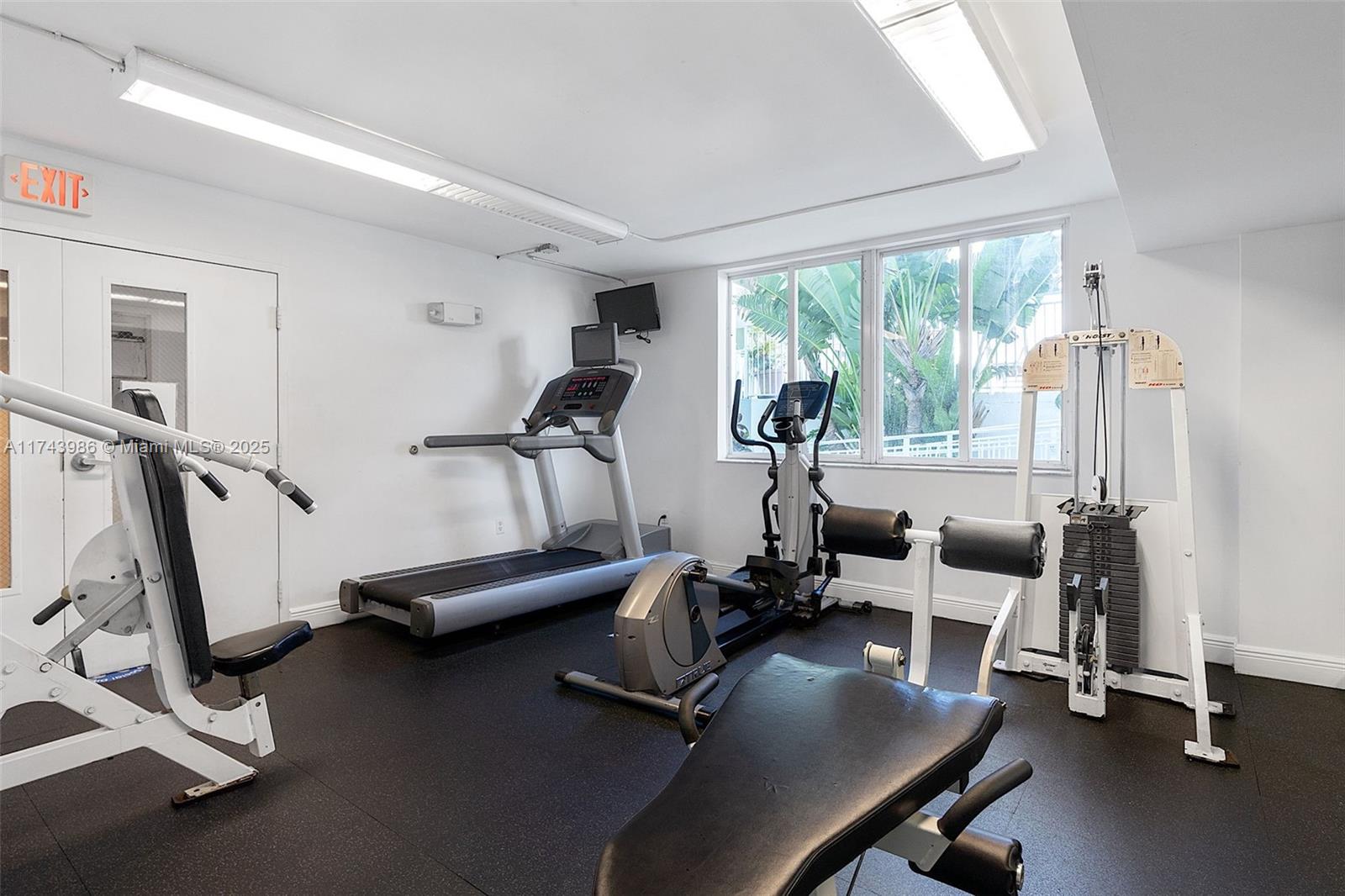 219 Northwest 12th Avenue, Unit 809 Miami, FL 33128 - Photo 31 of 32 a view of a room with gym equipment
