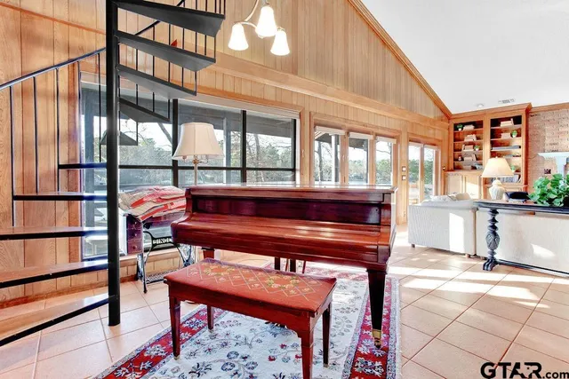 a sitting area with furniture and a window