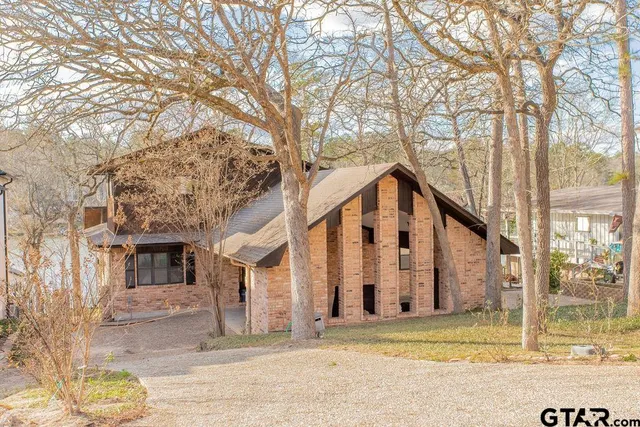 a view of a white building among the street