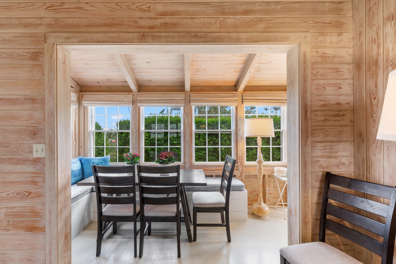 3 North Gully Road Nantucket, MA 02554 - Photo 10 of 43 a view of a dining room with furniture large windows and wooden floor