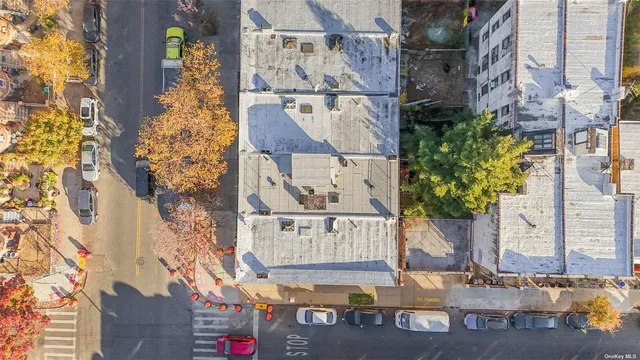 a street sign on a pole on a street