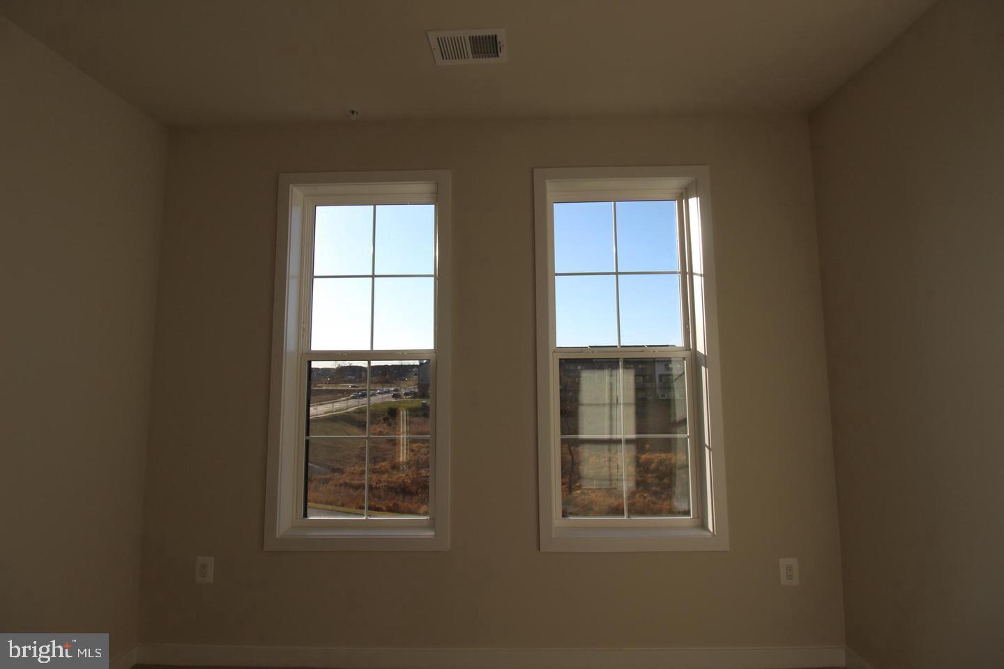 22383 Roanoke Rise Terrace Ashburn, VA 20148 - Photo 39 of 41 a view of an empty room with a window