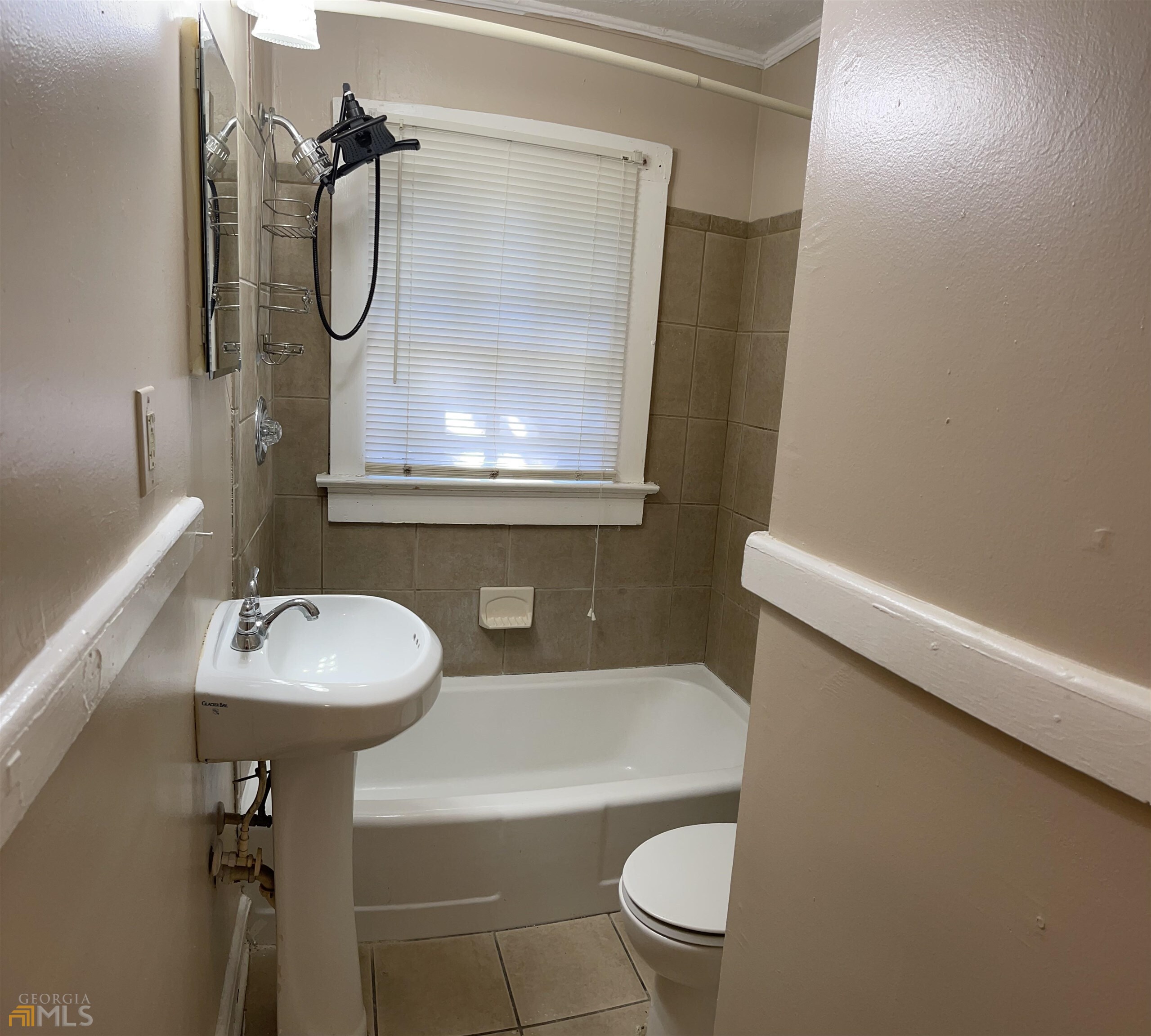 984 Byron Drive Southwest, Unit B Atlanta, GA 30310 - Photo 11 of 13 a bathroom with a sink a toilet and shower