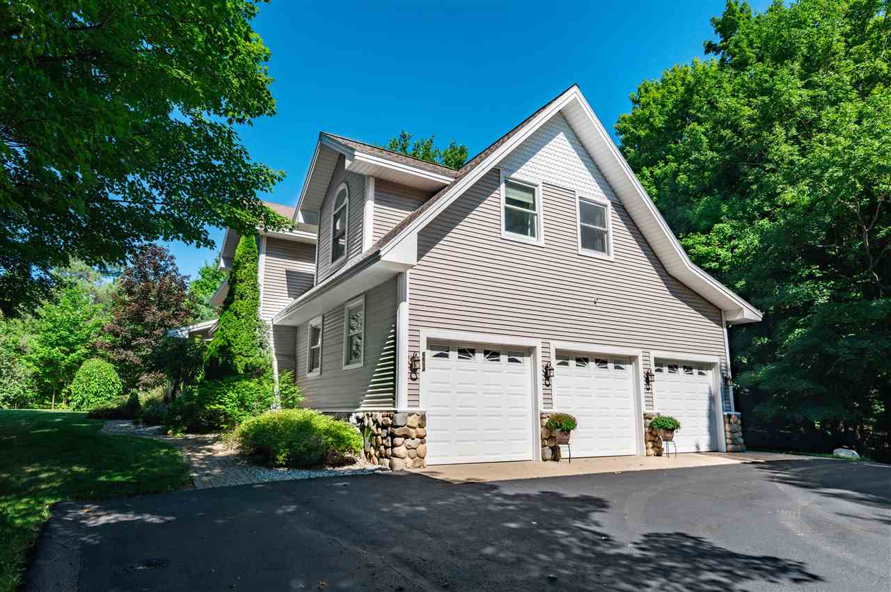 6694 Cedar Run Road Traverse City, MI 49684 - Photo 2 of 54 1900115-1.JPG